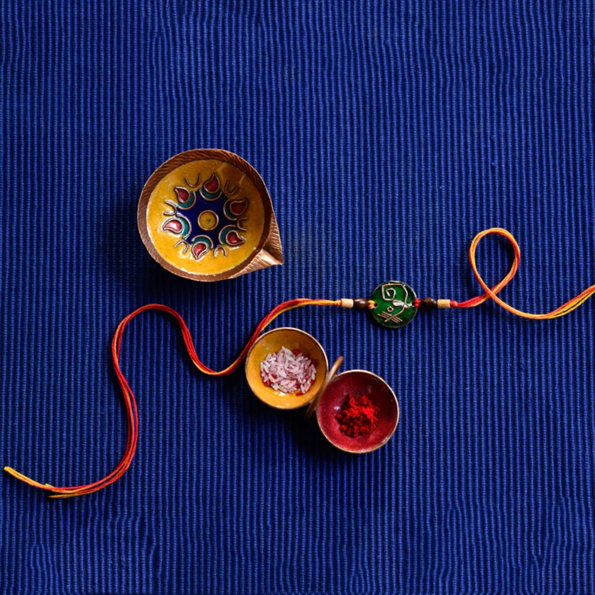 Copper Rakhi - Buy Copper Minakari Rakhi Online 