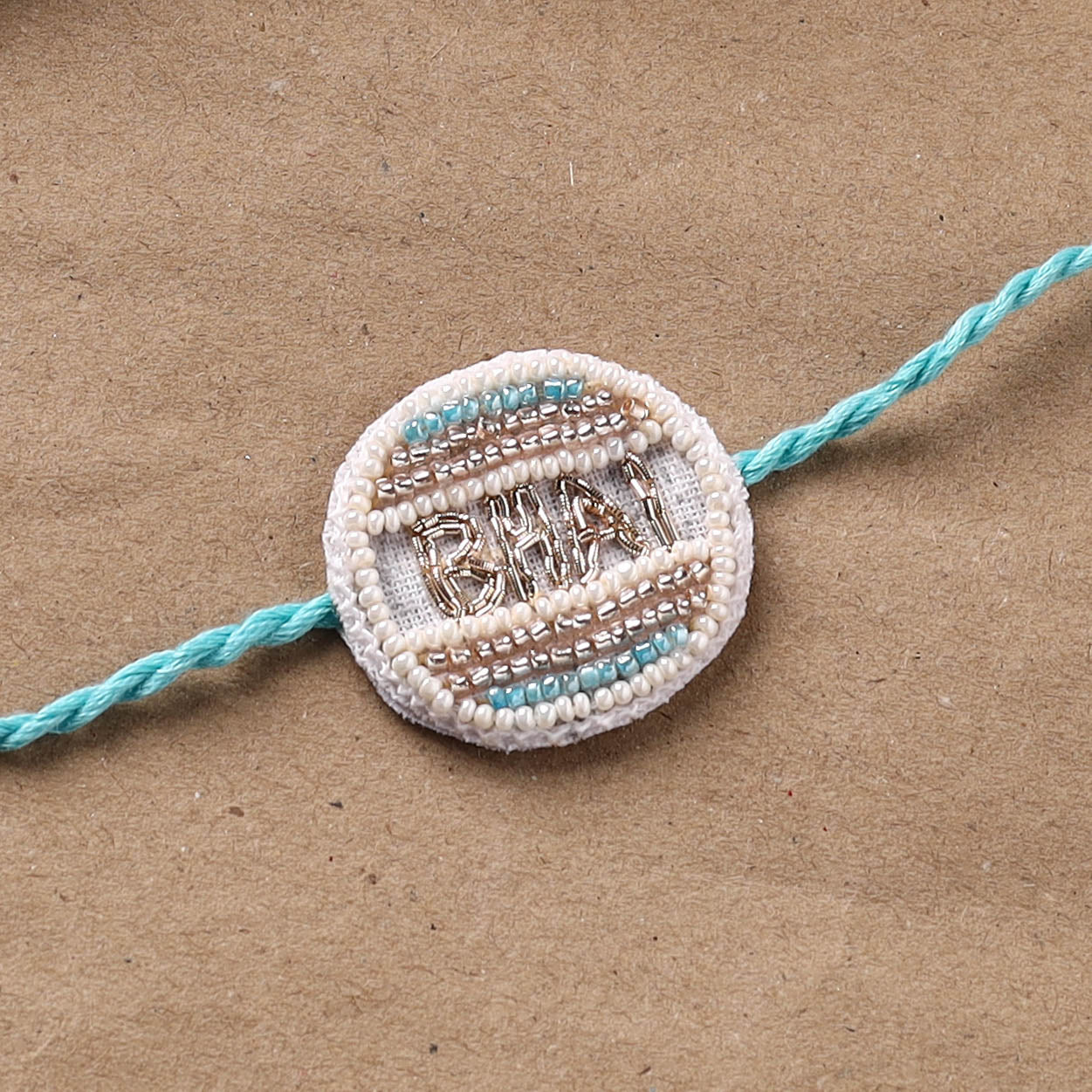 Hand Embroidered Thread Work Rakhi 05