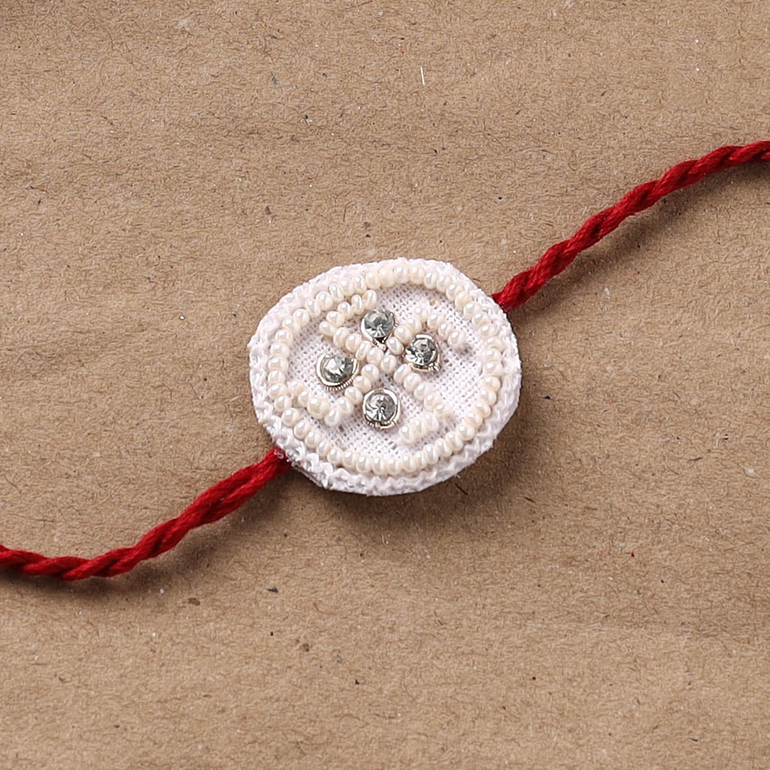 Hand Embroidered Thread Work Rakhi 06