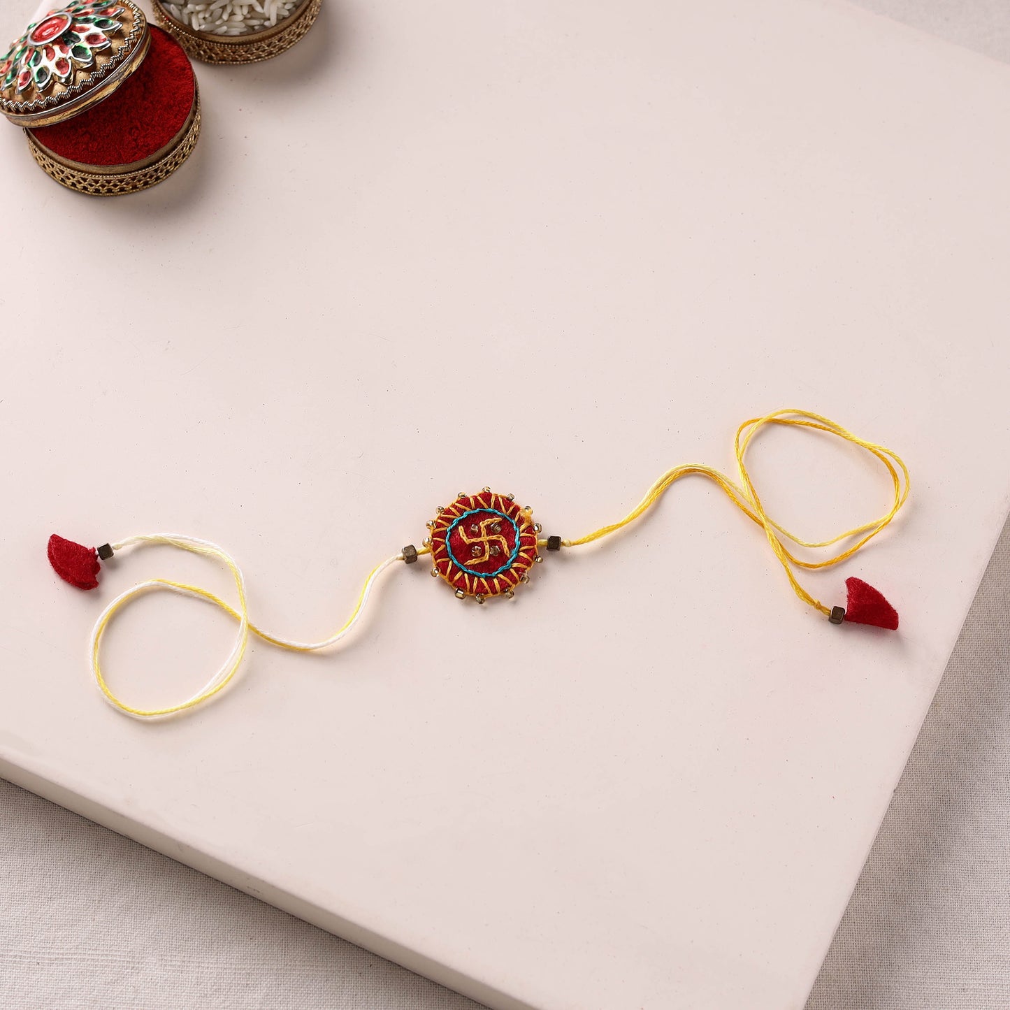 Swastika - Hand Embroidered Bead Work Felt Rakhi 08