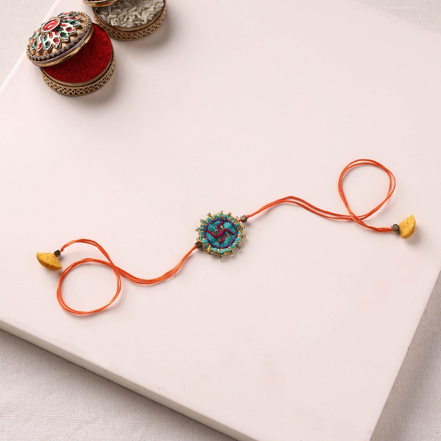 Swastika - Hand Embroidered Felt & Bead Work Rakhi 09