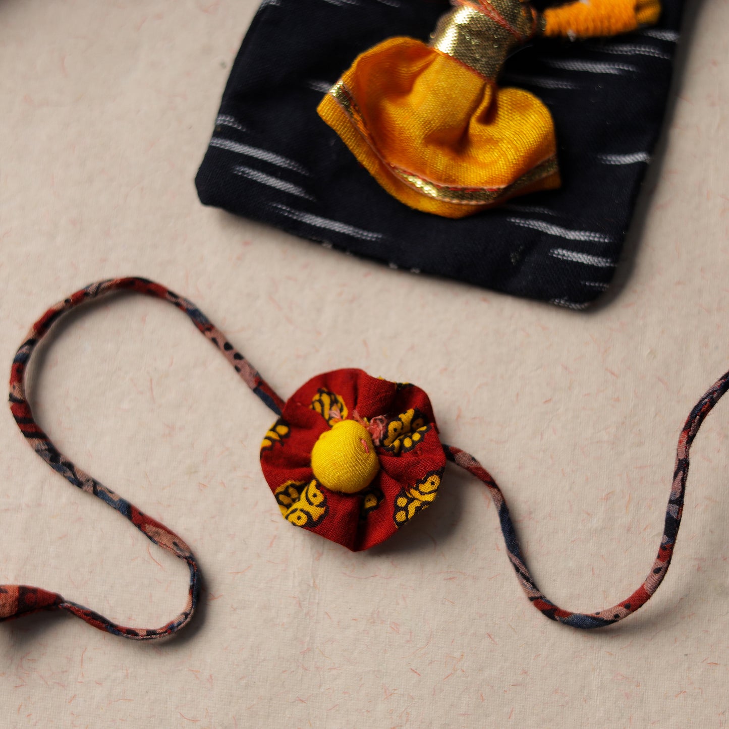 Buy Handcrafted Flower Fabart Rakhi 24 Online at iTokri.com