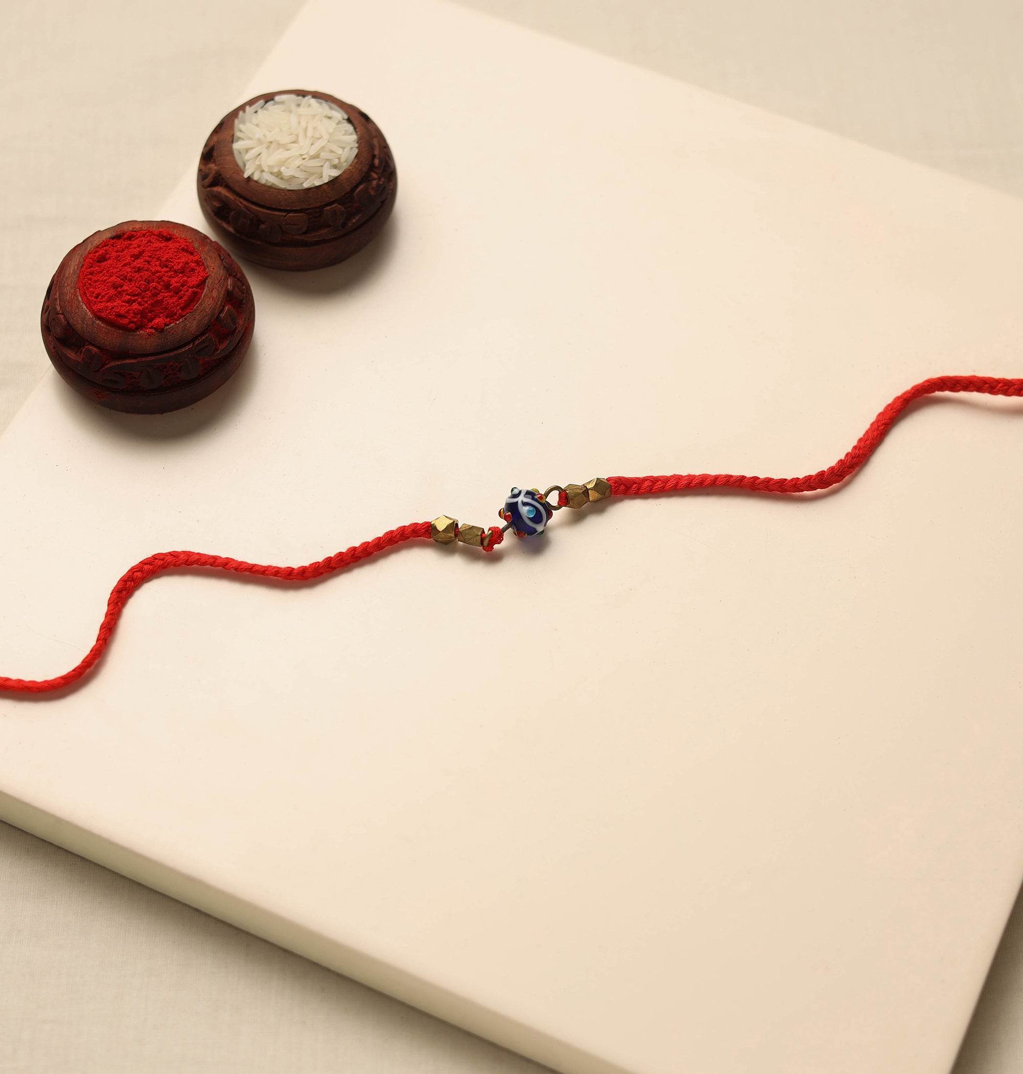 Green - Handcrafted Tribal Dokra Brass Thread Rakhi 35