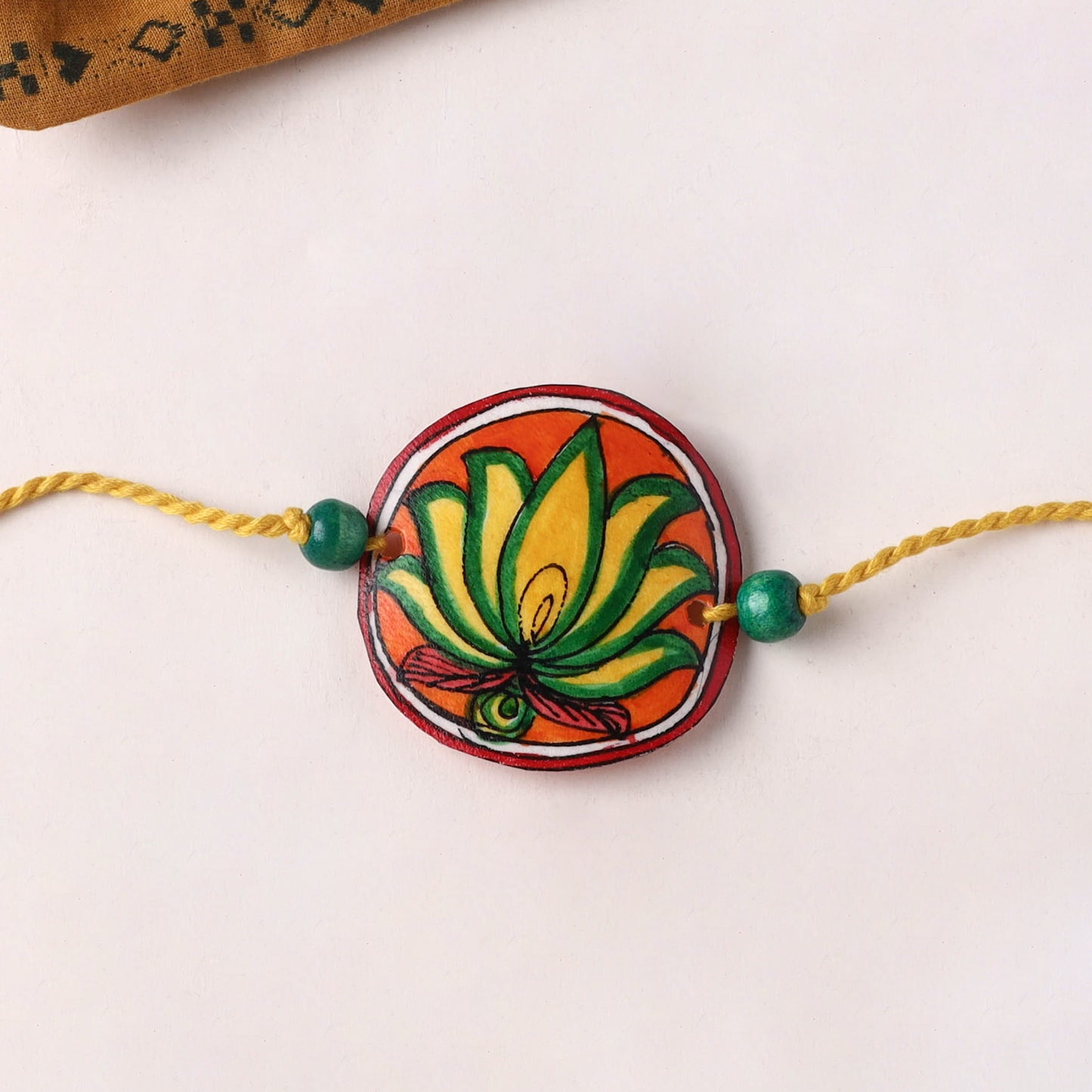 Handpainted Tholu Bommalata Leather Rakhi (Assorted) 02