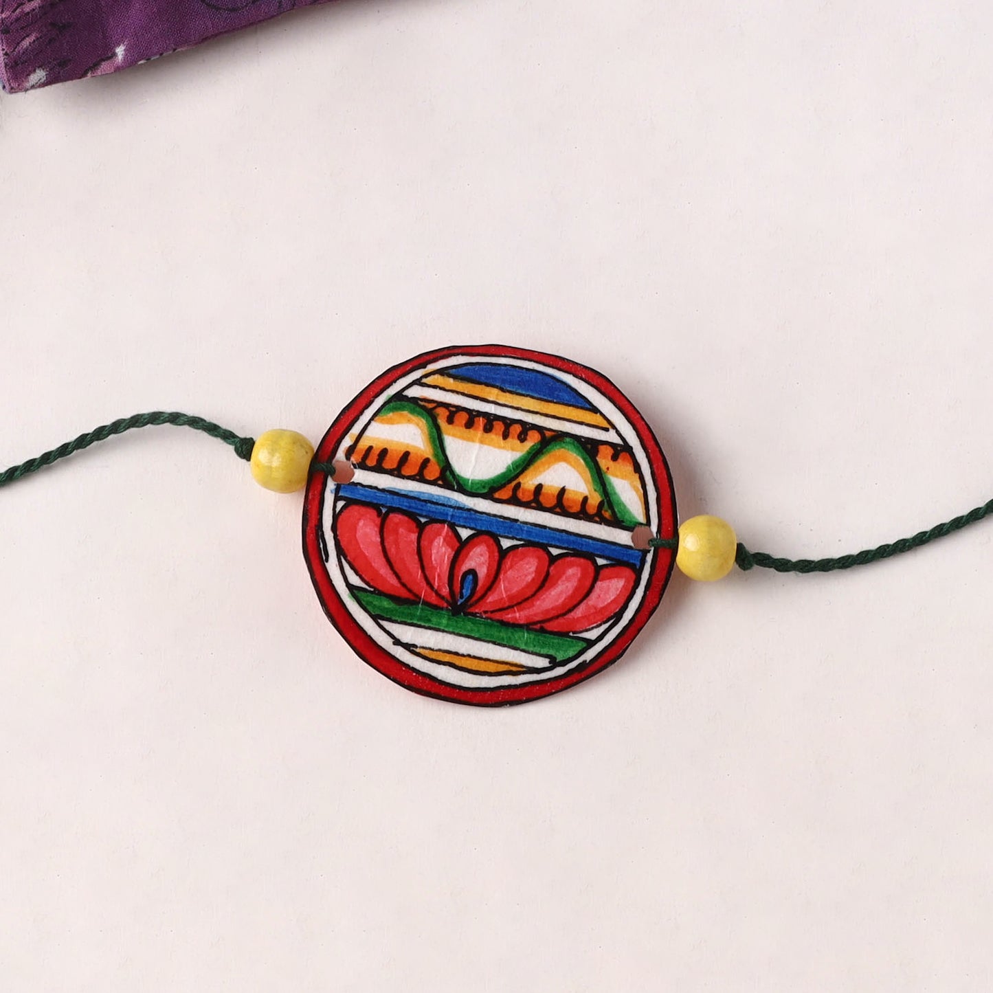 Handpainted Tholu Bommalata Leather Rakhi (Assorted) 11