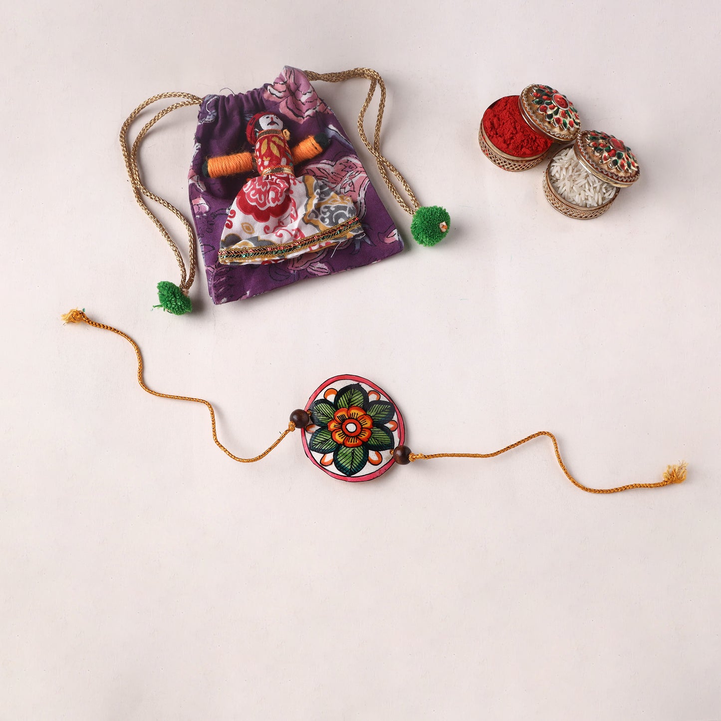 Handpainted Tholu Bommalata Leather Rakhi (Assorted) 15