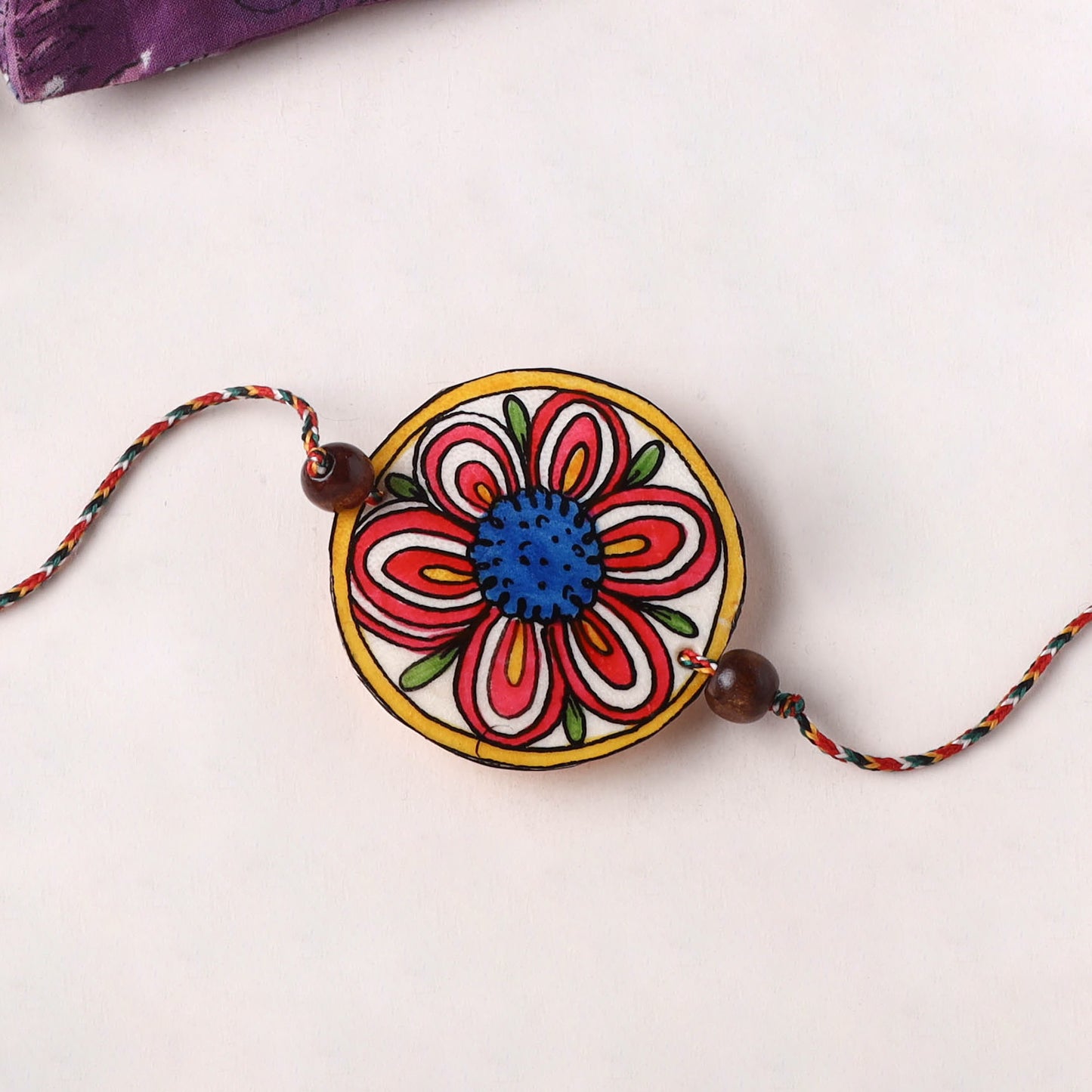 Flower - Handpainted Tholu Bommalata Leather Rakhi (Assorted) 16