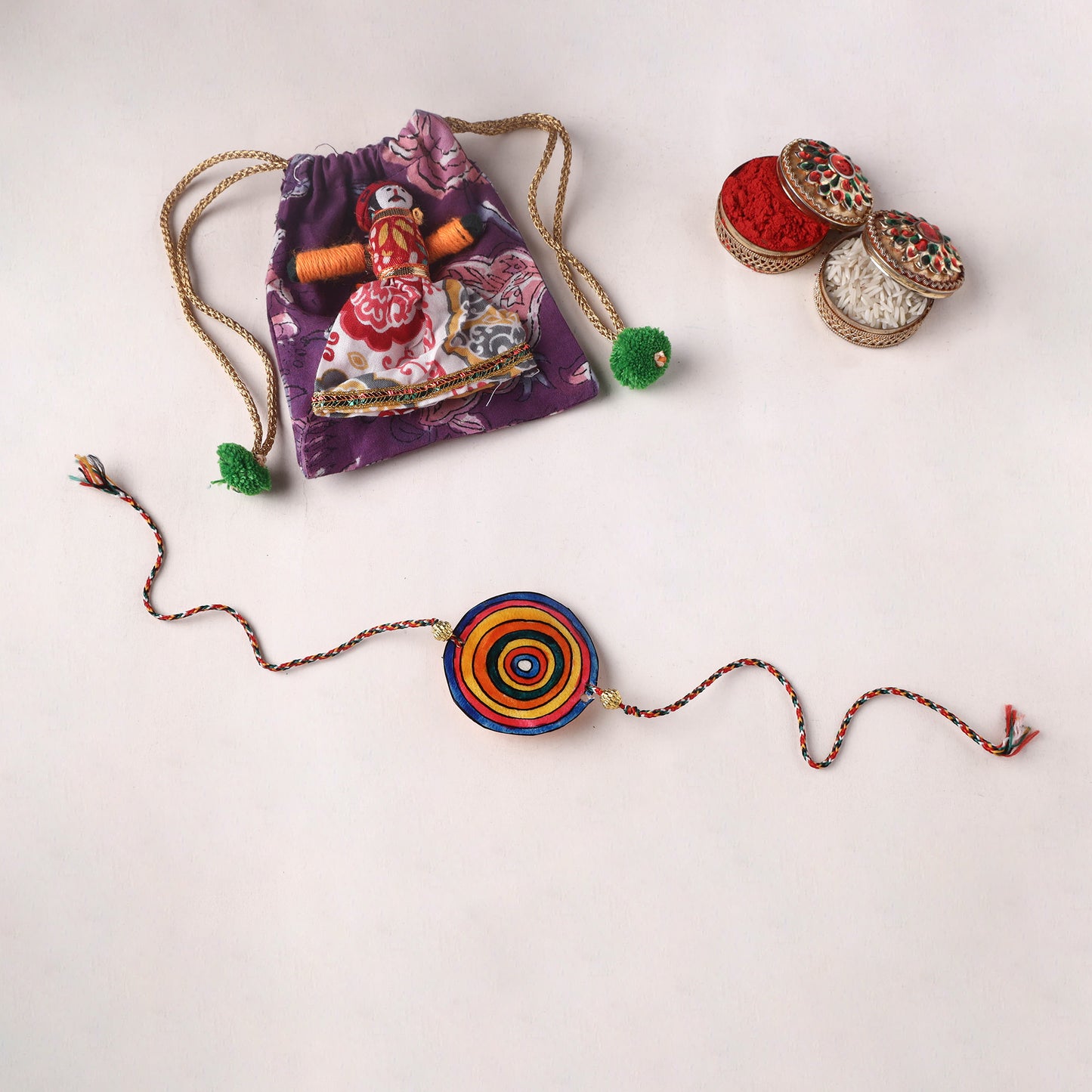 Handpainted Tholu Bommalata Leather Rakhi (Assorted) 17