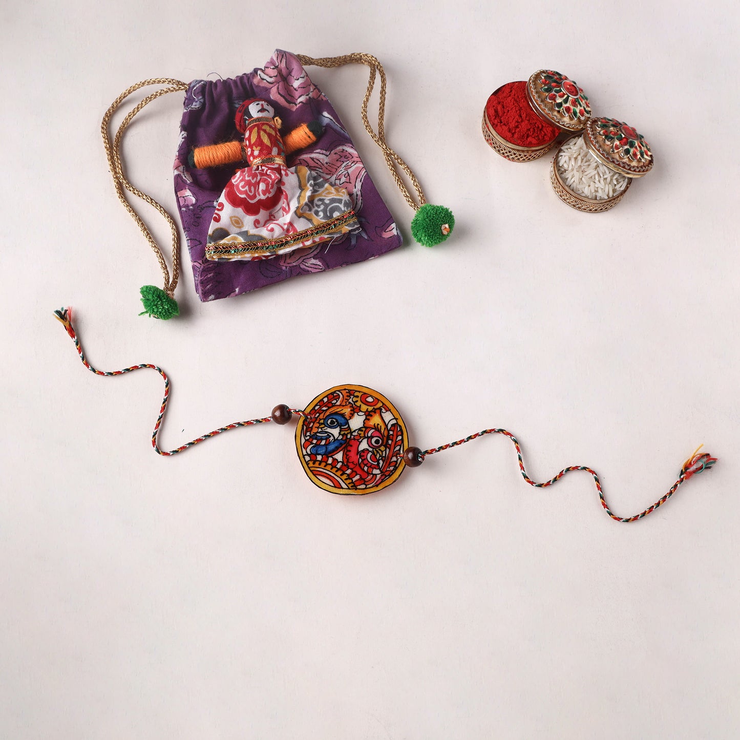Peacocks - Handpainted Tholu Bommalata Leather Rakhi (Assorted) 22