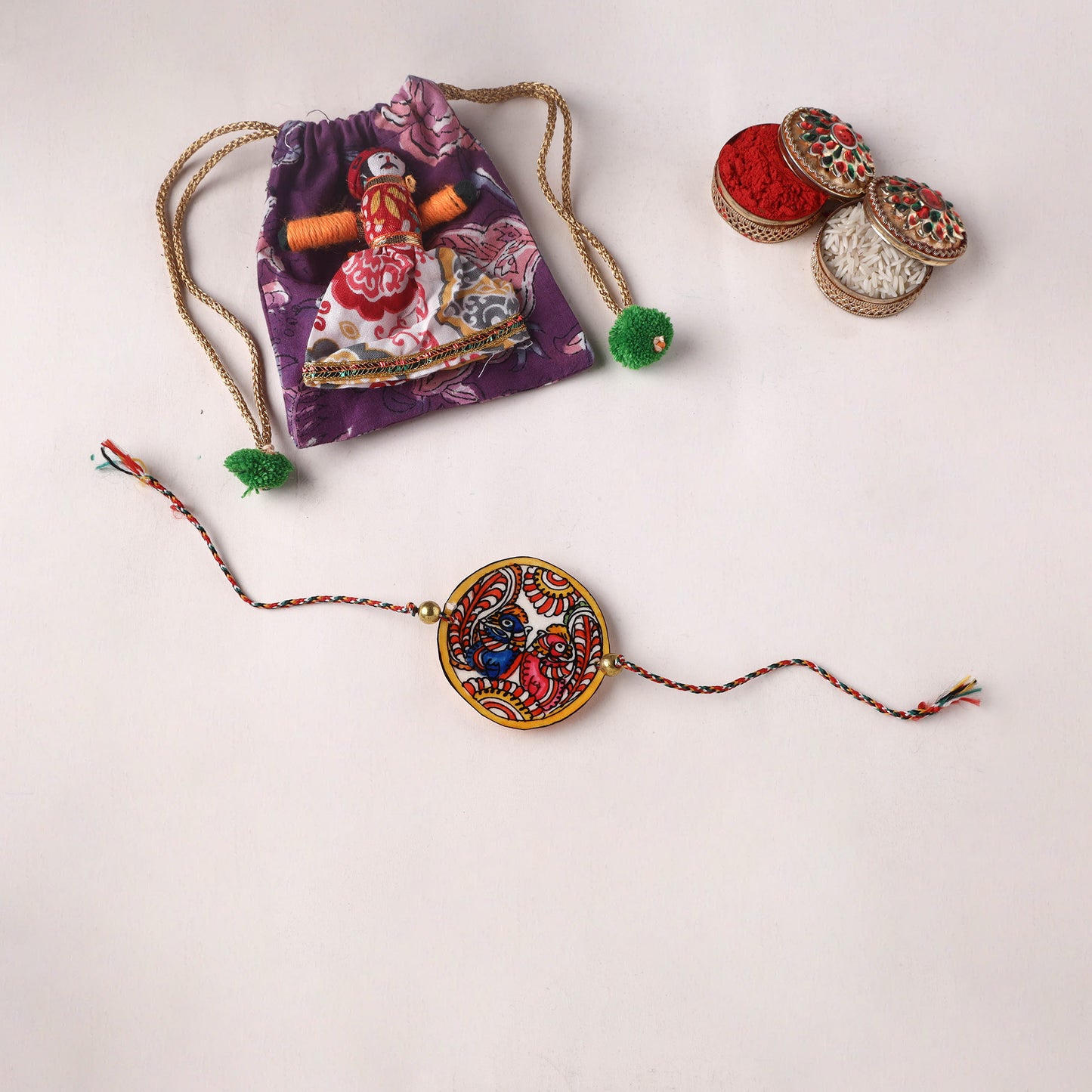 Peacocks - Handpainted Tholu Bommalata Leather Rakhi (Assorted) 27