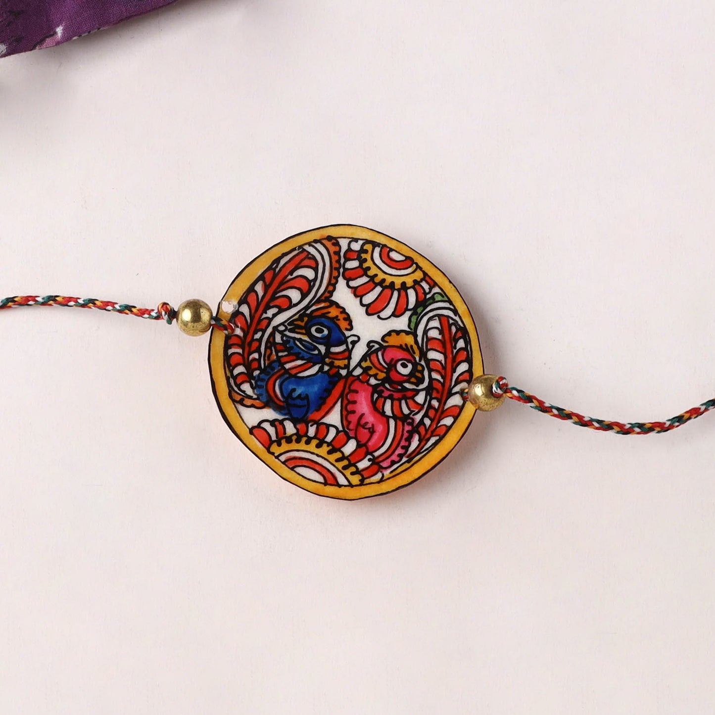 Peacocks - Handpainted Tholu Bommalata Leather Rakhi (Assorted) 27