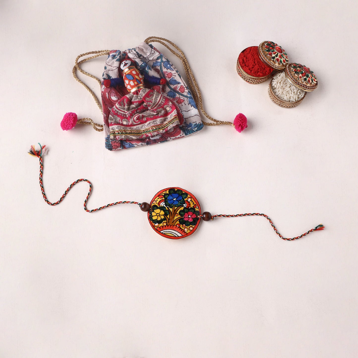 Flower - Handpainted Tholu Bommalata Leather Rakhi (Assorted) 30