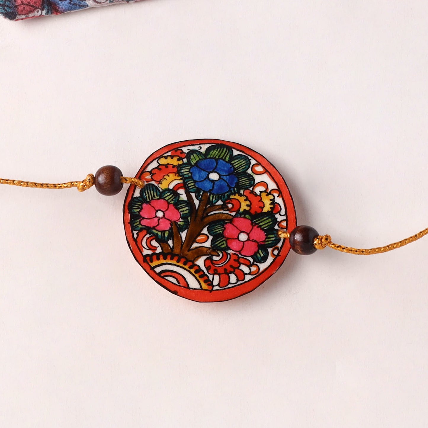 Flower - Handpainted Tholu Bommalata Leather Rakhi (Assorted) 31