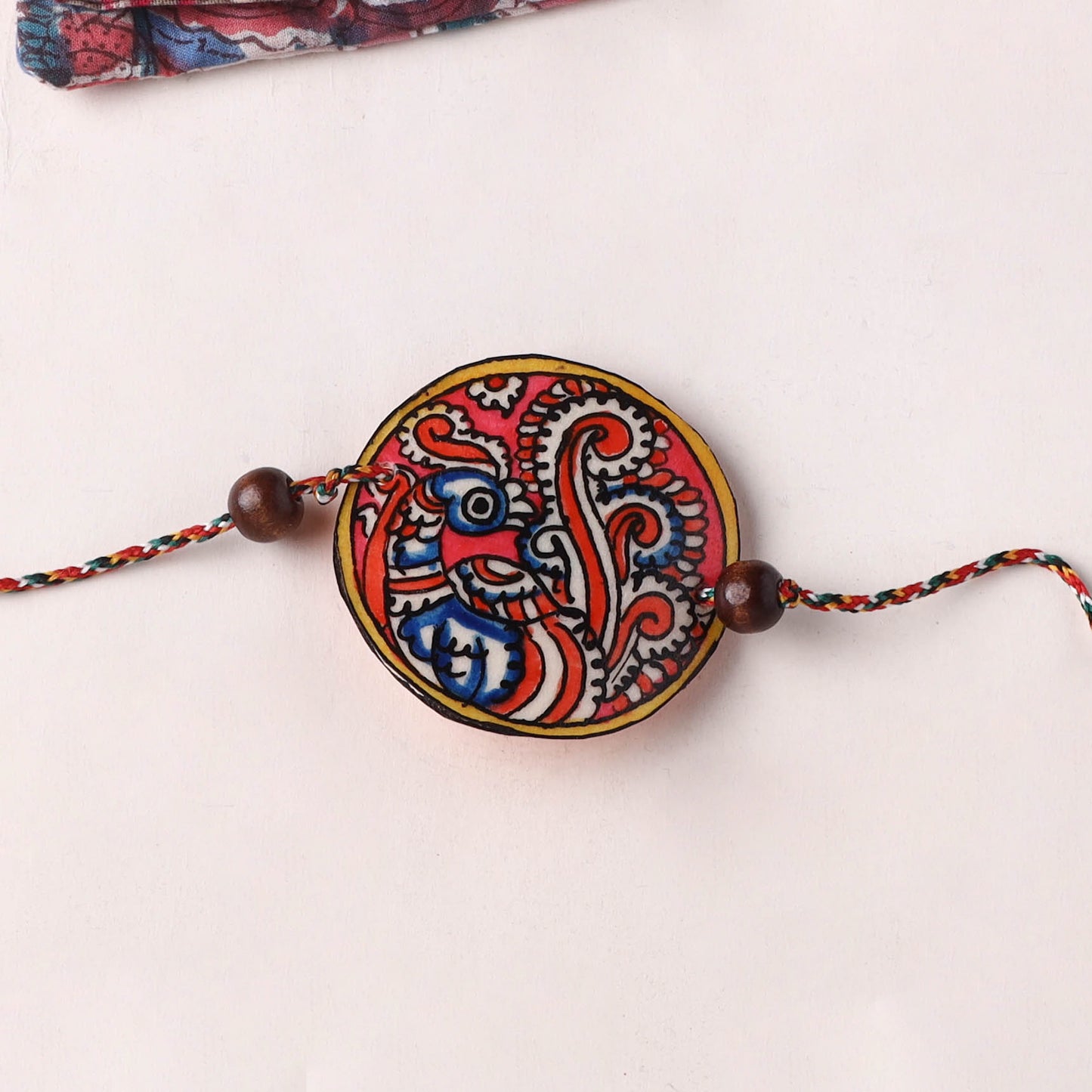 Peacock - Handpainted Tholu Bommalata Leather Rakhi (Assorted) 32