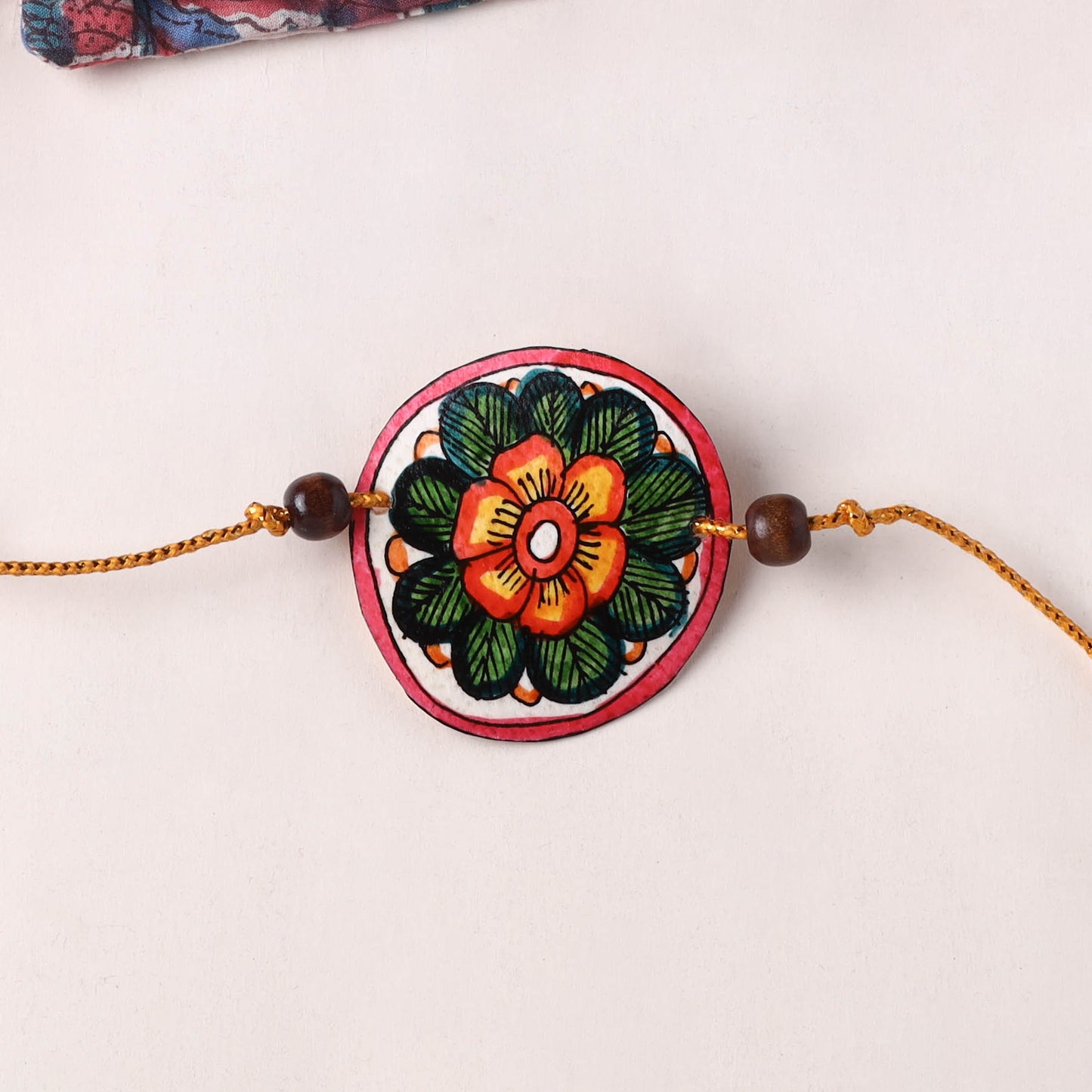Flower - Handpainted Tholu Bommalata Leather Rakhi (Assorted) 35