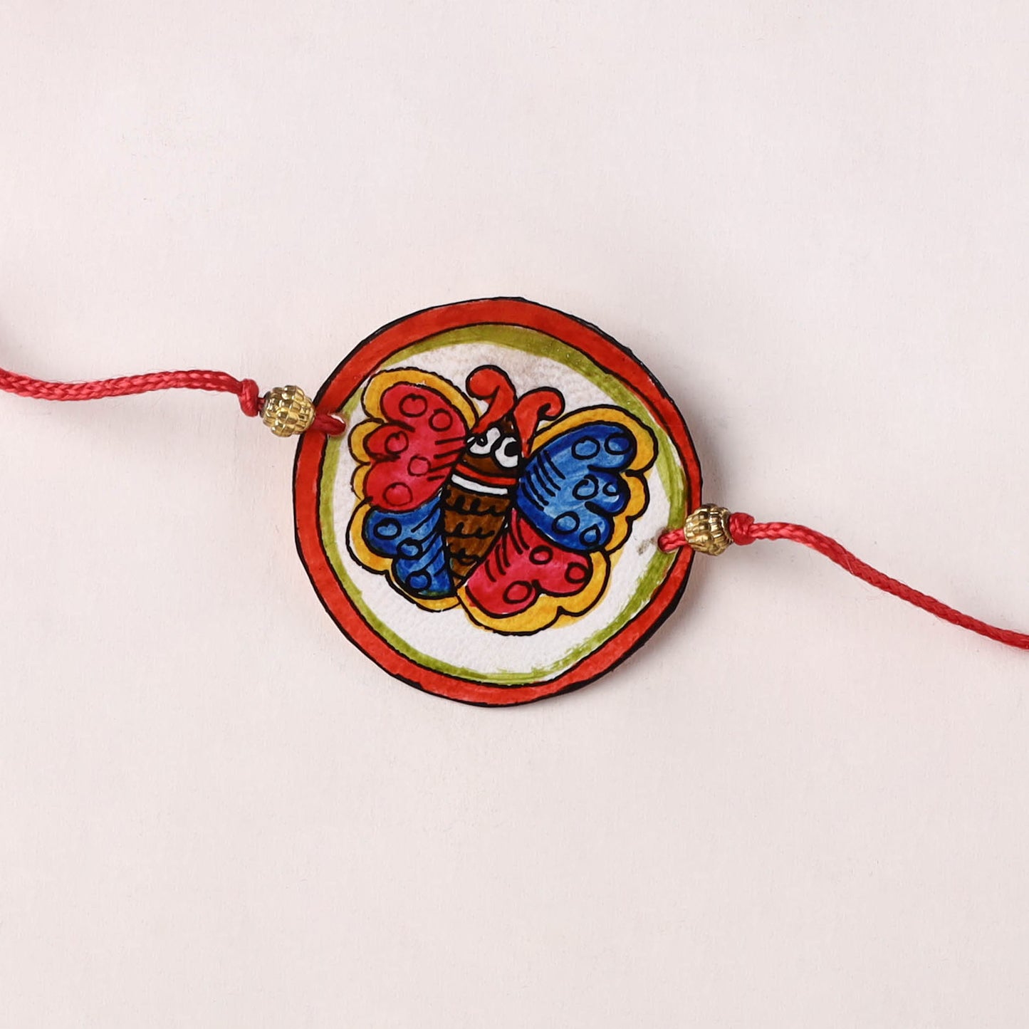 Butterfly - Handpainted Tholu Bommalata Leather Rakhi (Assorted) 20
