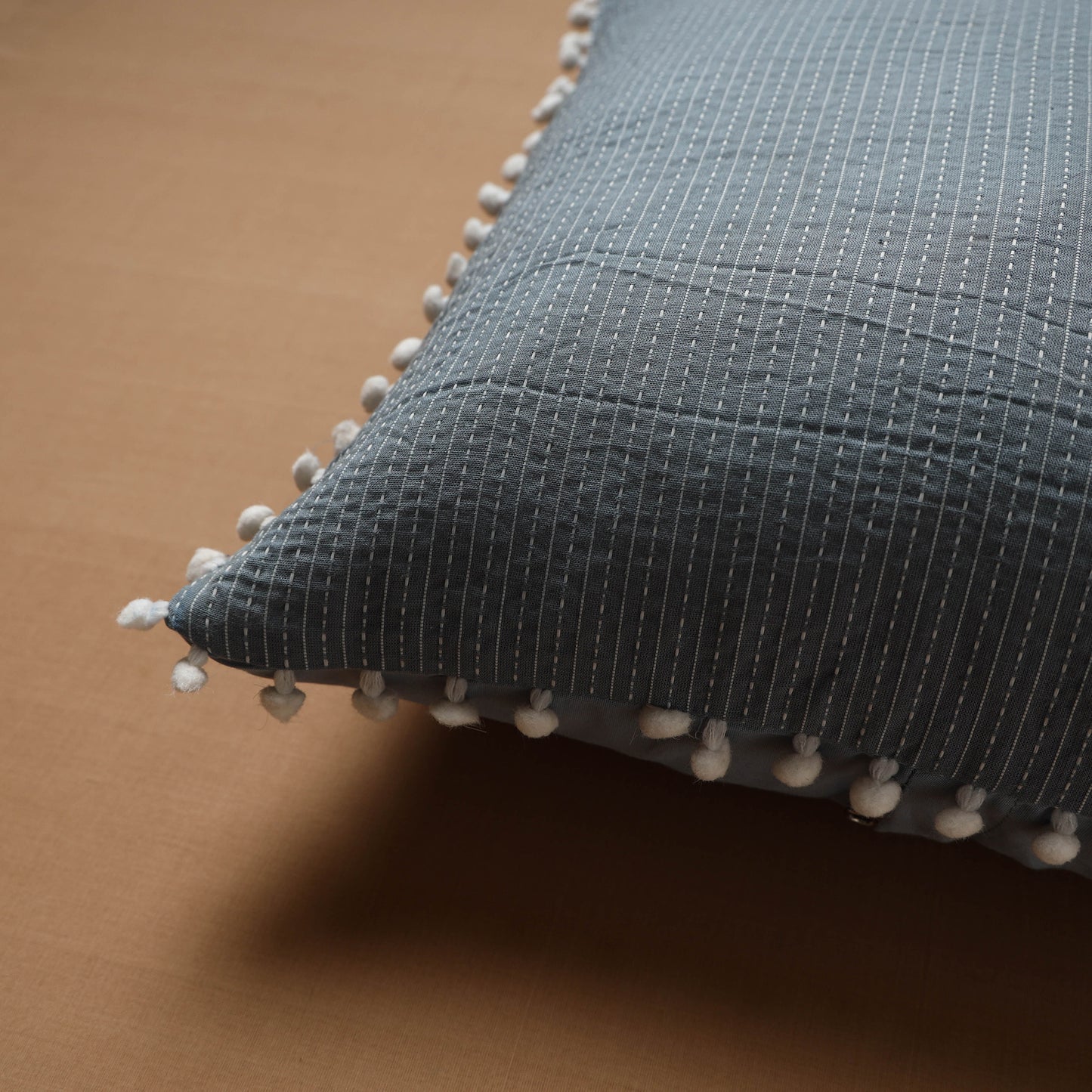 Running Stitch Plain Cushion Cover with Pom Pom (16 x 16 in) 01