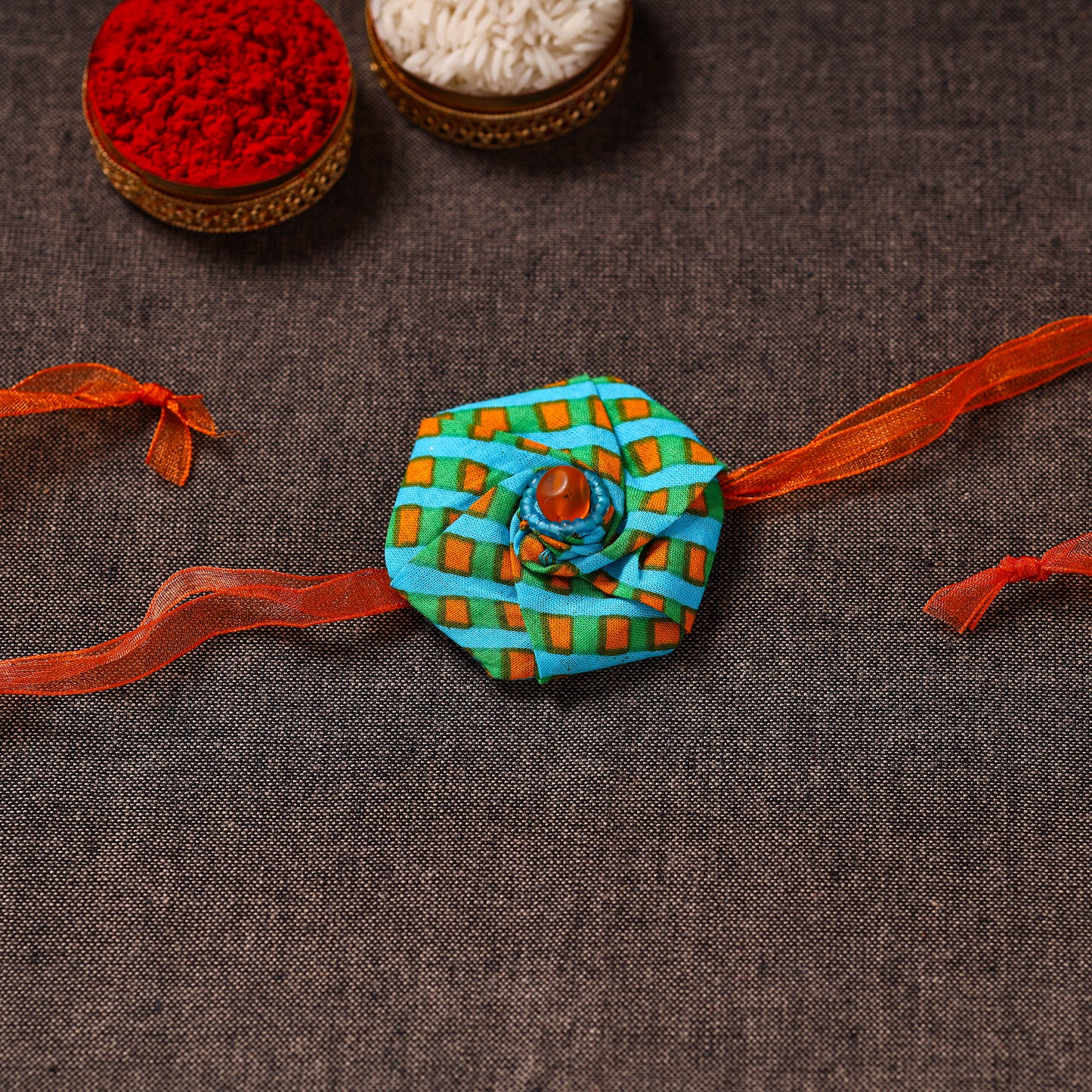 Twisted Rose - Handmade Blue Mango Rakhi