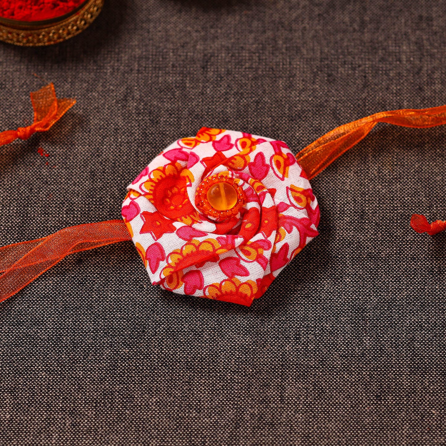 Twisted Rose - Handmade Blue Mango Rakhi