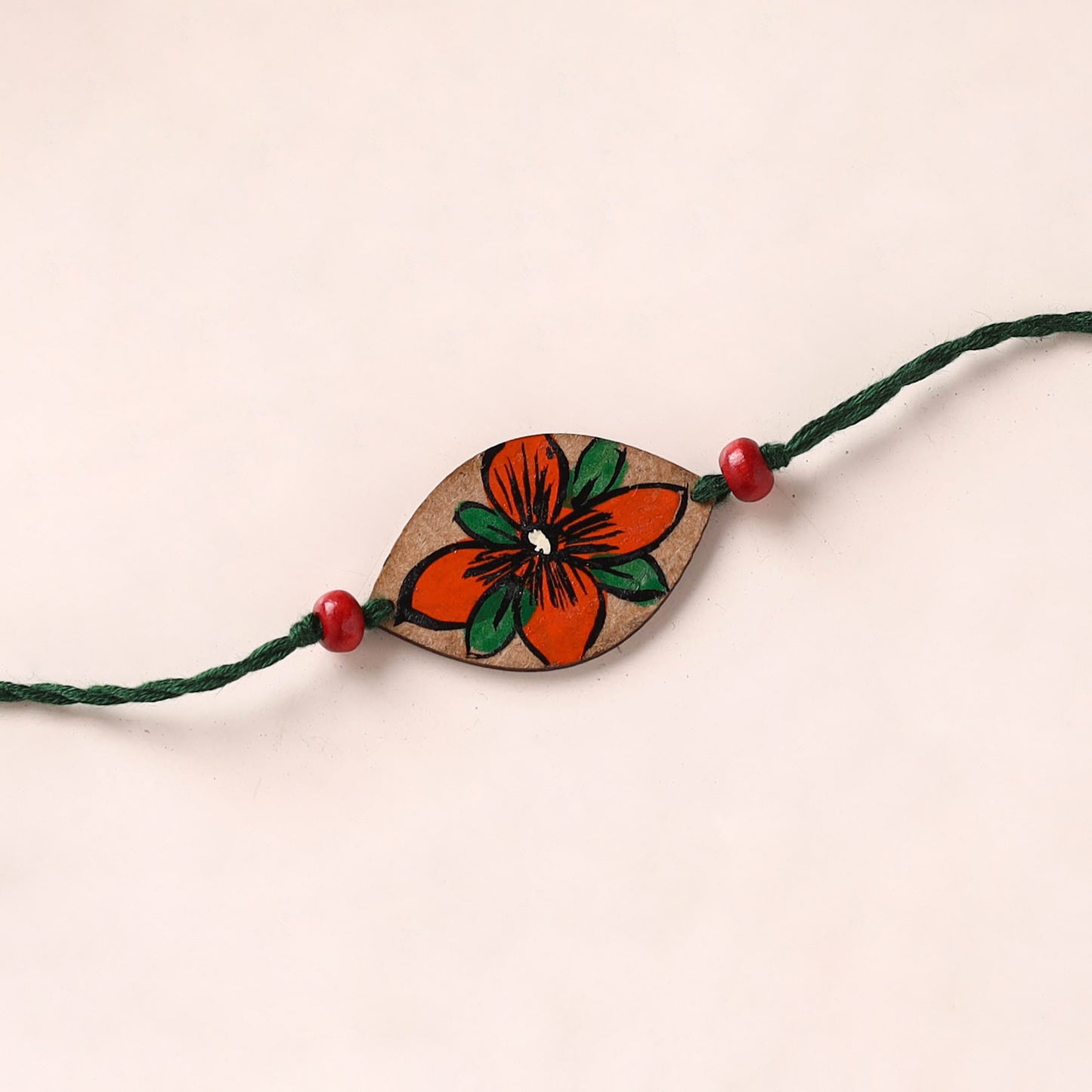 Pattachitra Handpainted Wooden Rakhi 44