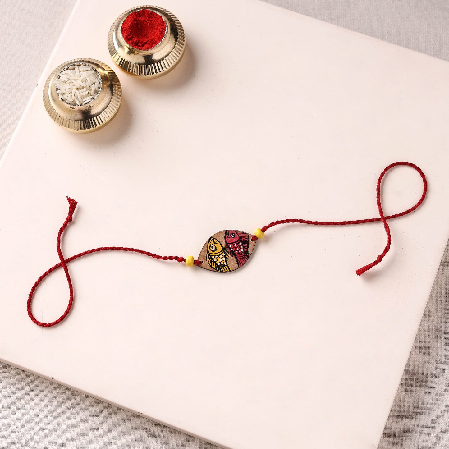 Pattachitra Handpainted Wooden Rakhi 02