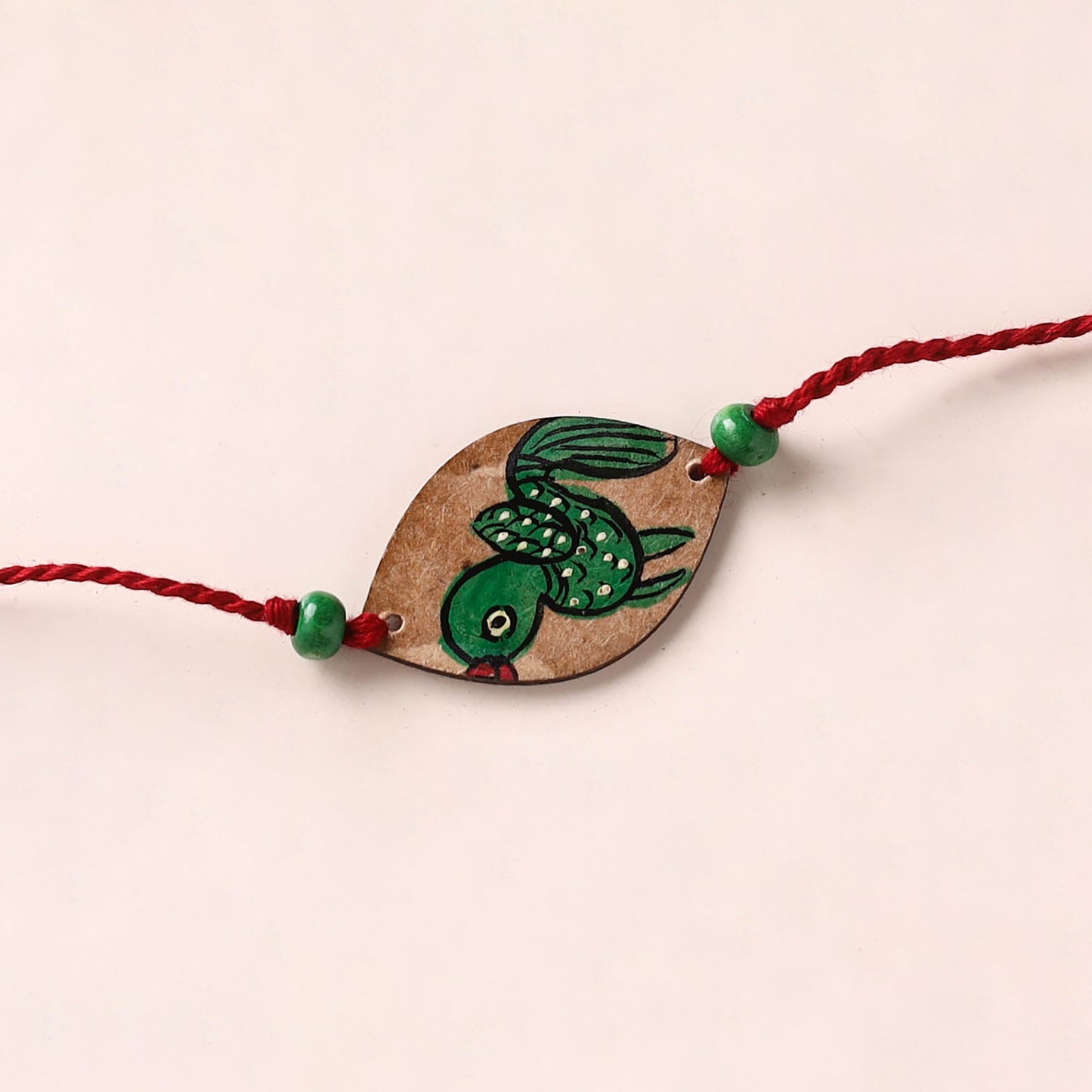 Pattachitra Handpainted Wooden Rakhi 05