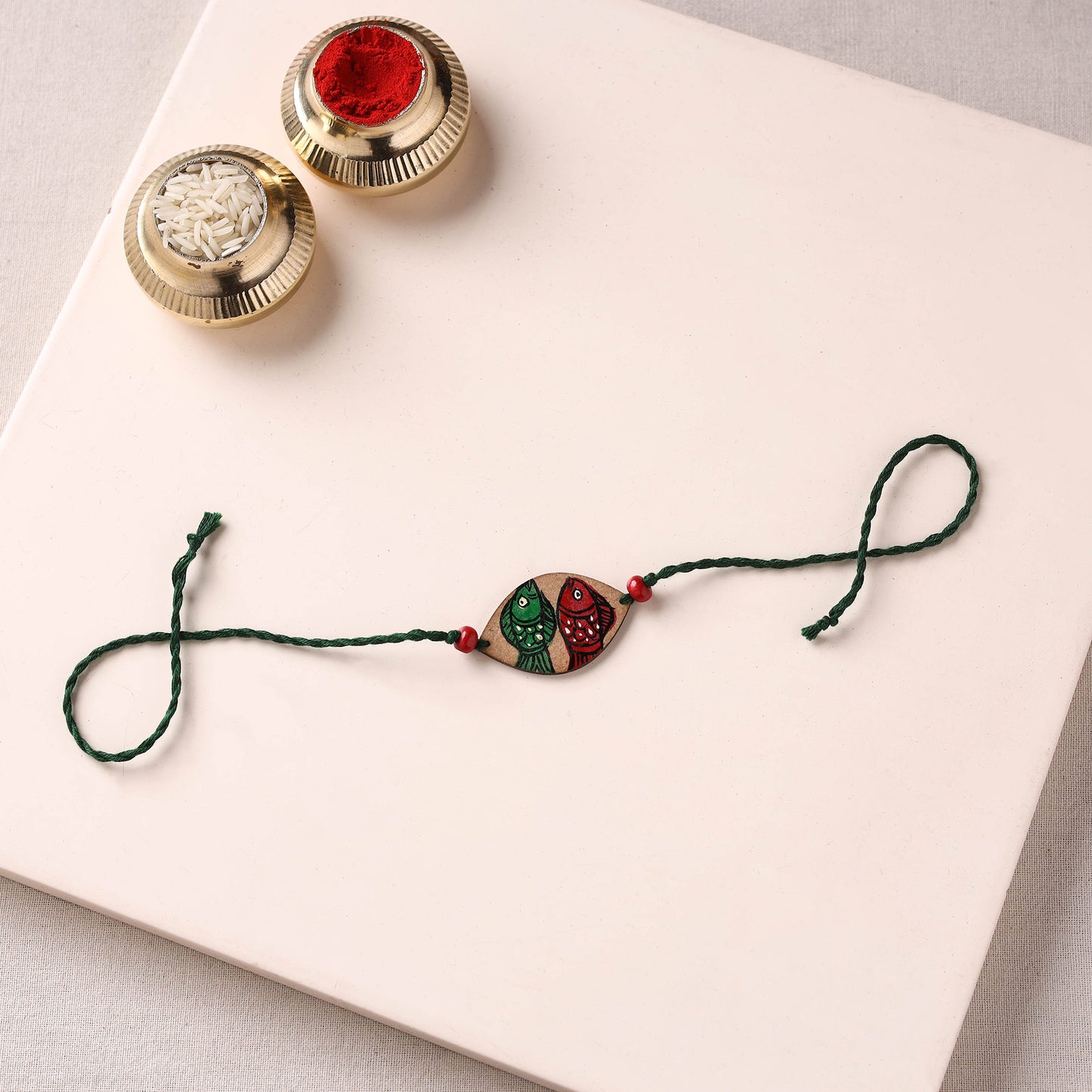 Pattachitra Handpainted Wooden Rakhi 07