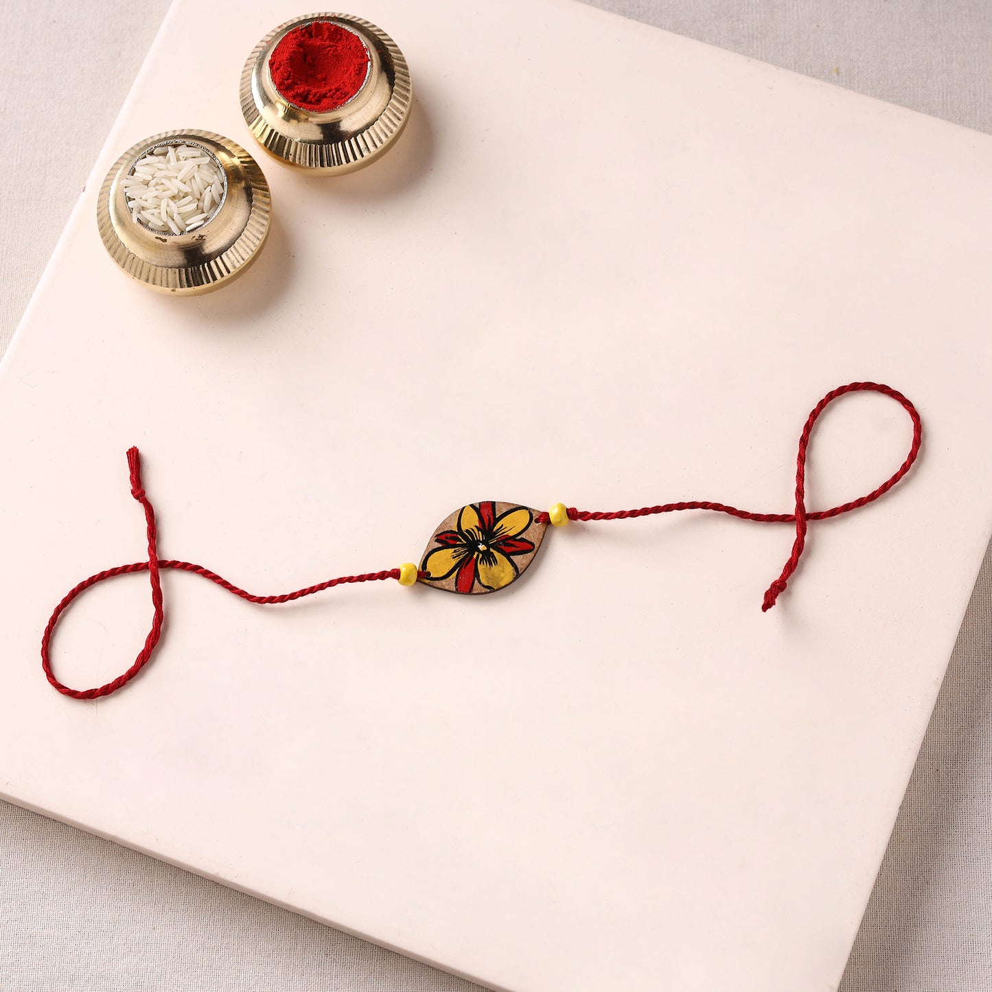 Pattachitra Handpainted Wooden Rakhi 08