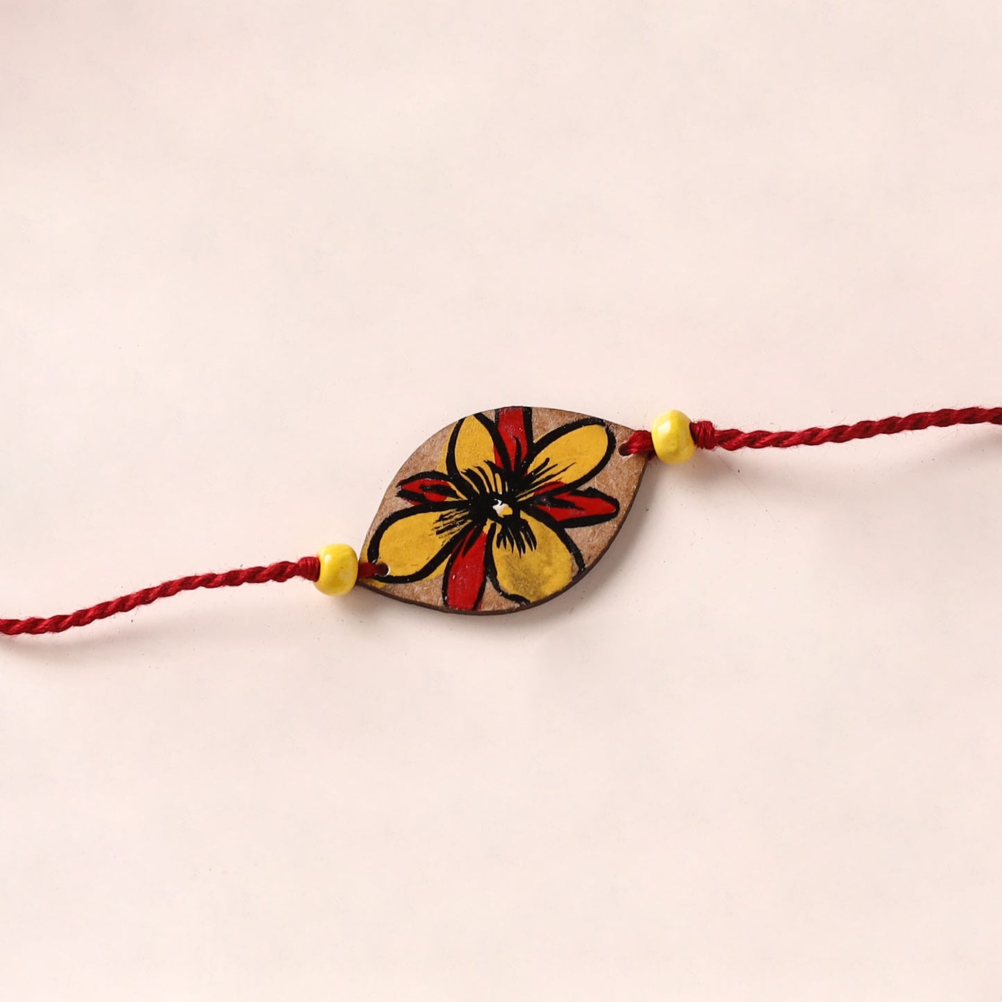 Pattachitra Handpainted Wooden Rakhi 08