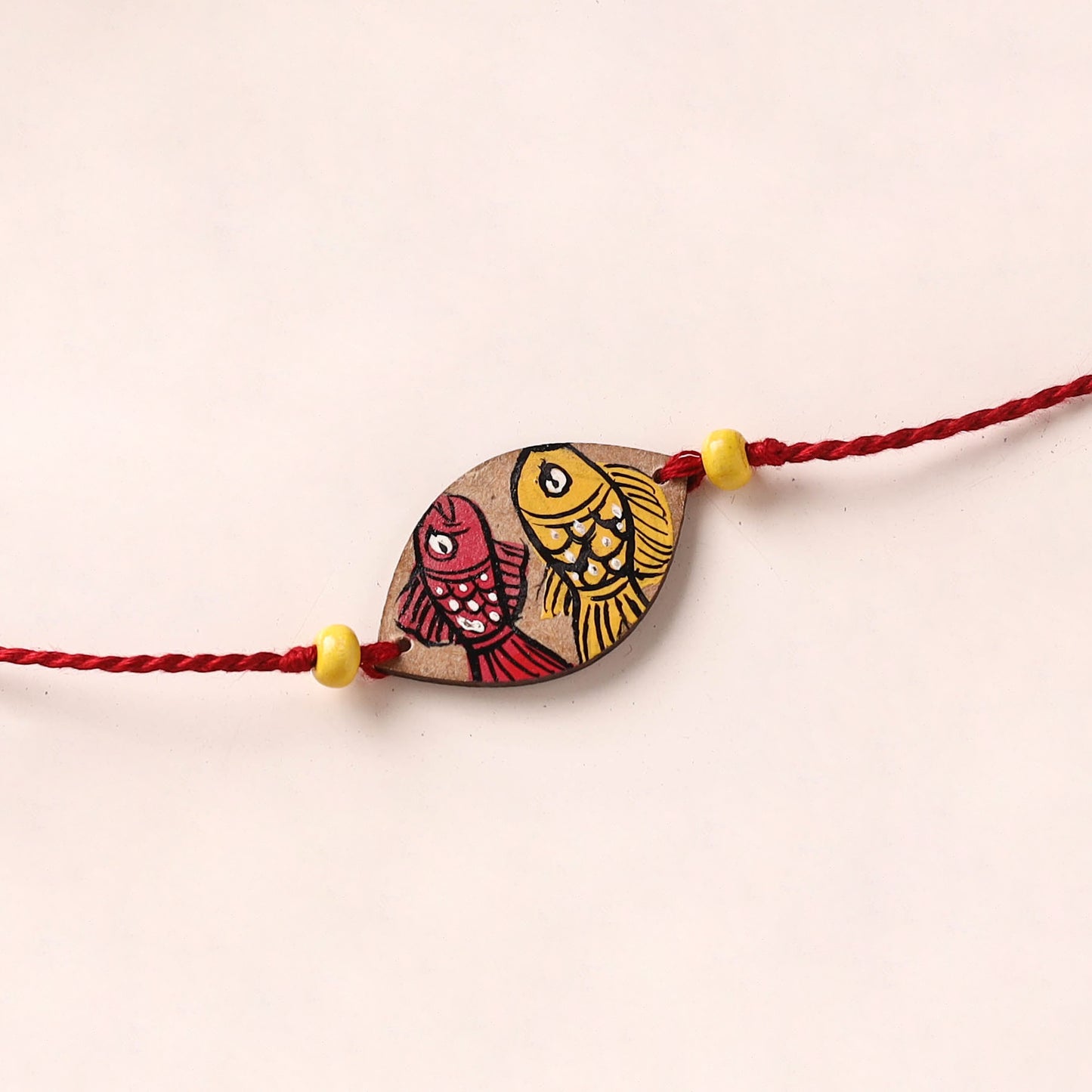 Pattachitra Handpainted Wooden Rakhi 14