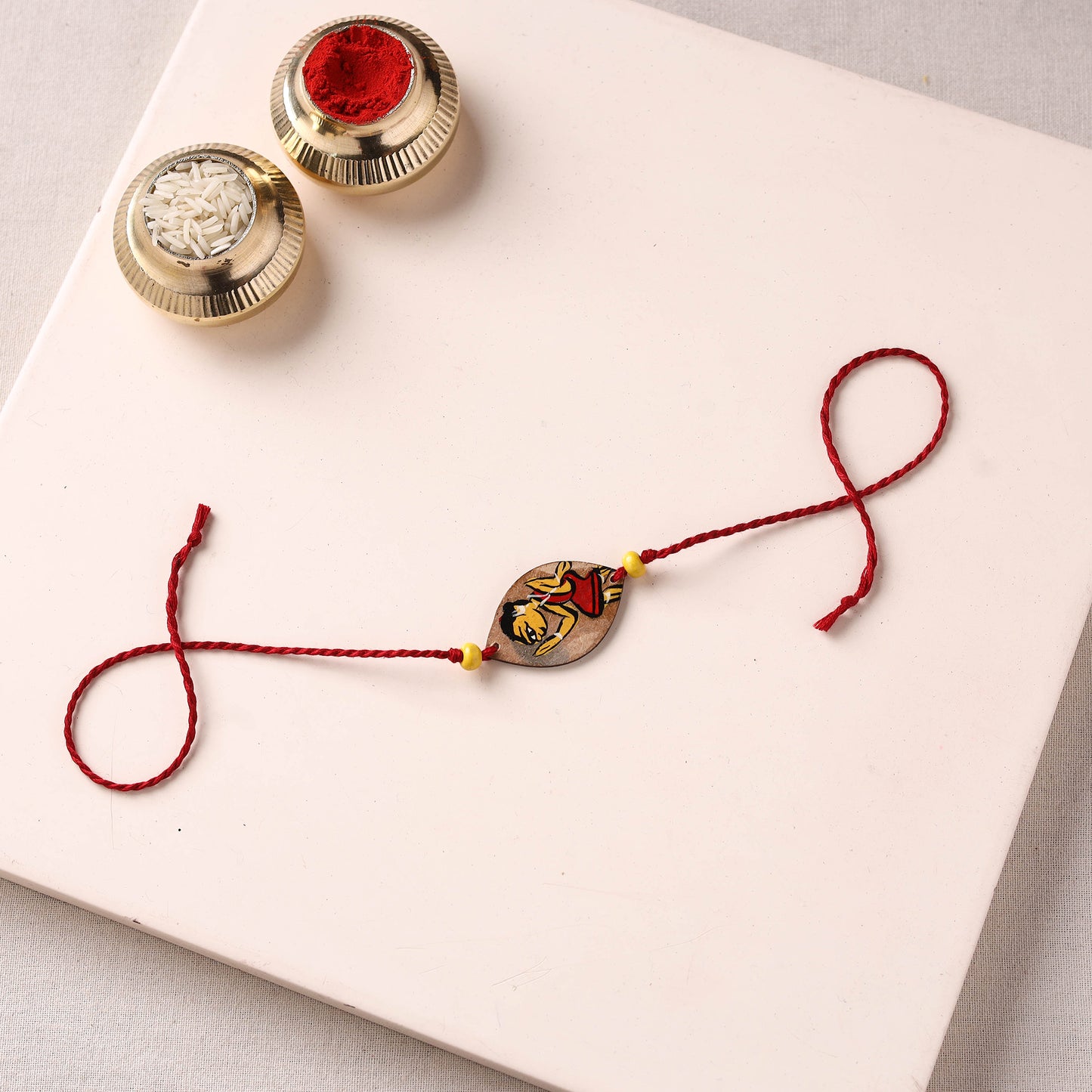 Pattachitra Handpainted Wooden Rakhi 17