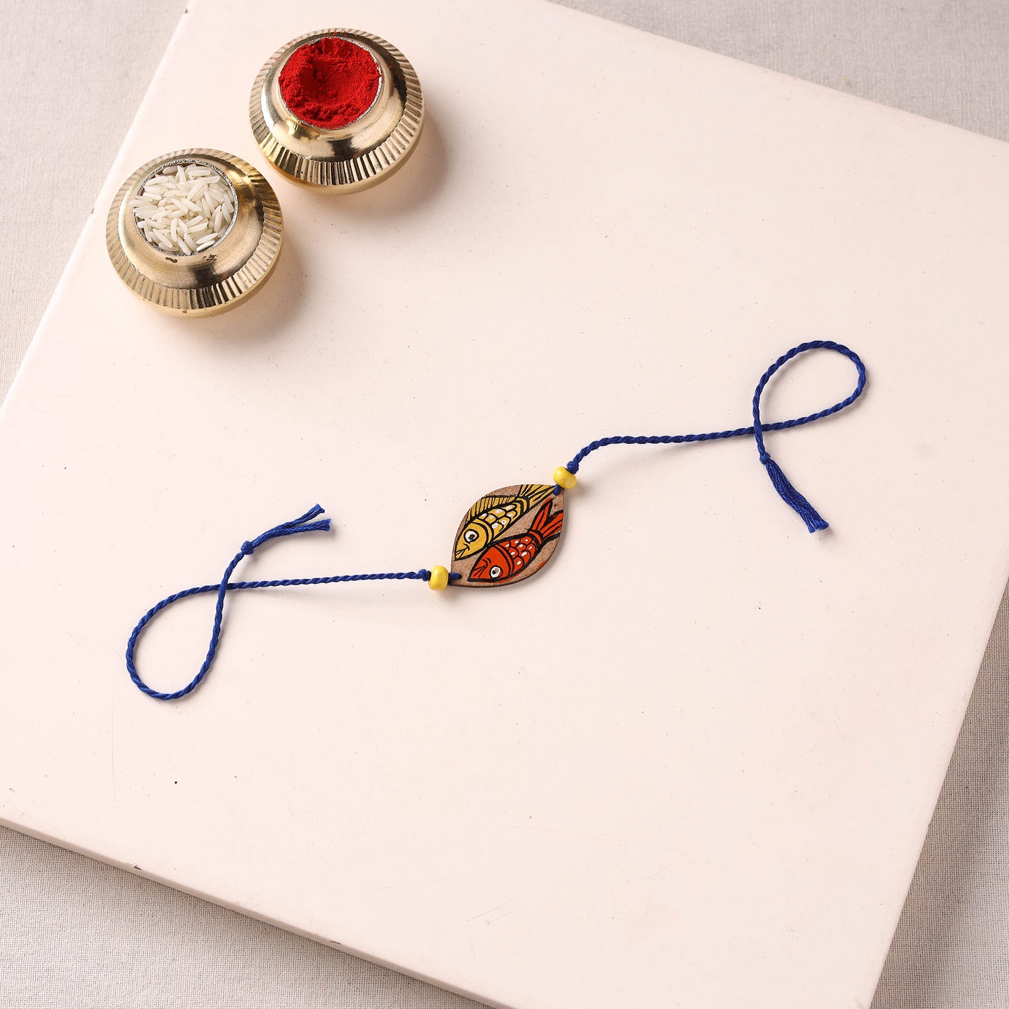 Pattachitra Handpainted Wooden Rakhi 21