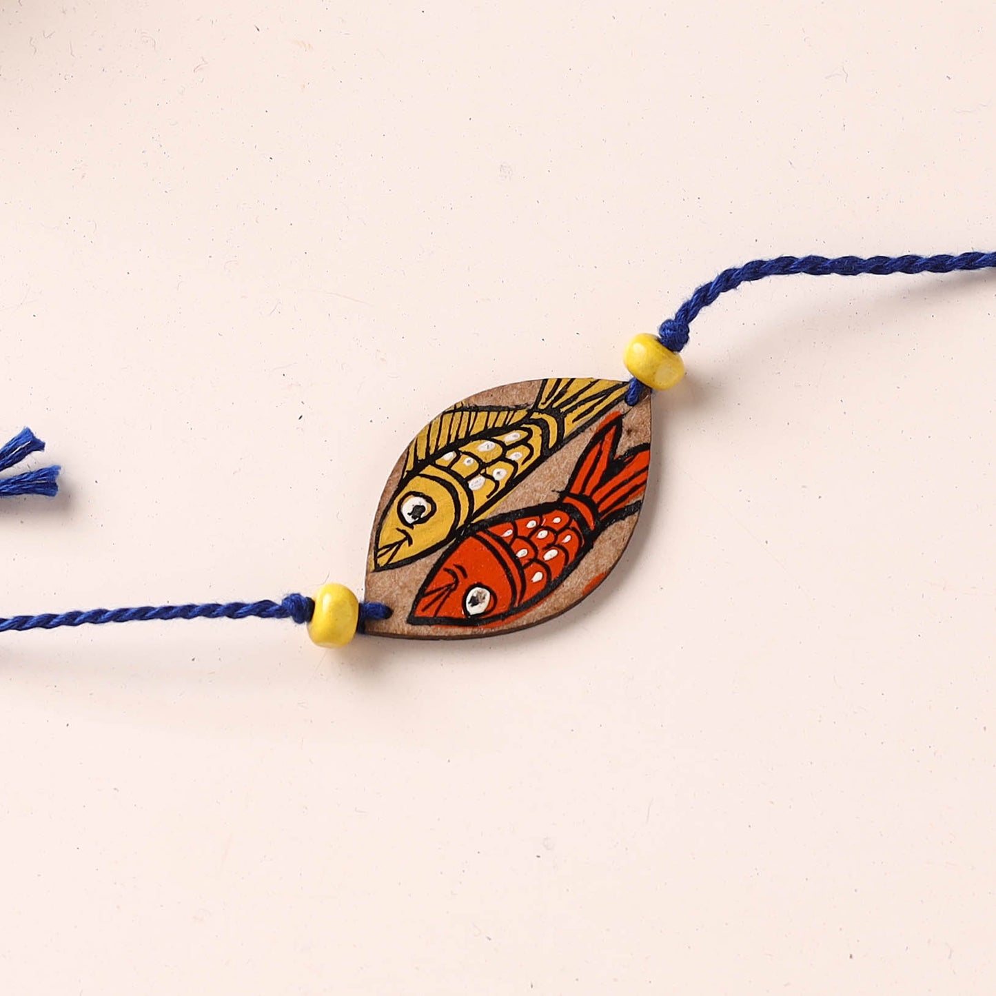 Pattachitra Handpainted Wooden Rakhi 21