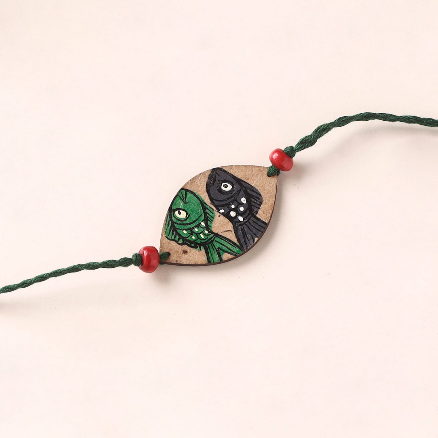 Pattachitra Handpainted Wooden Rakhi 24