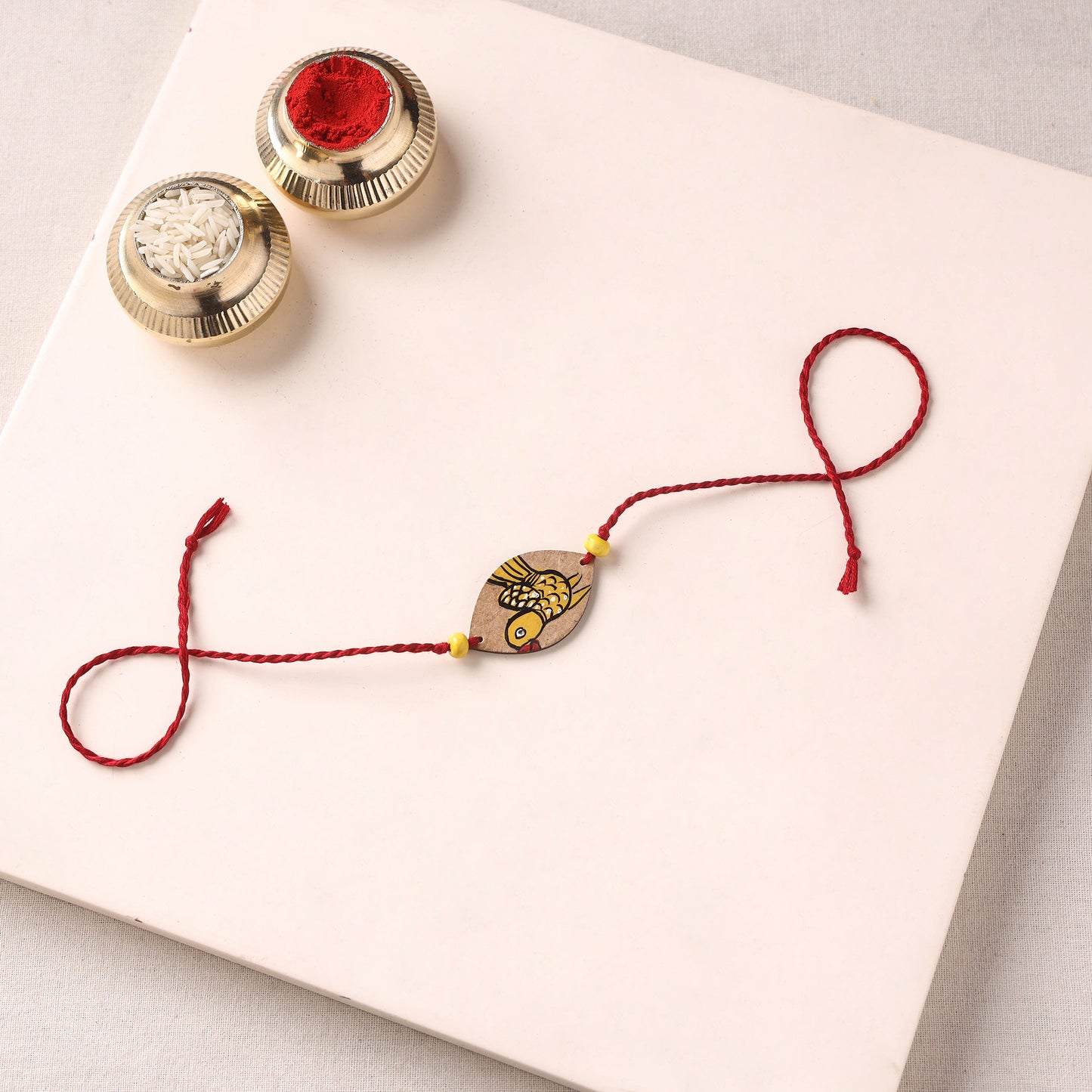 Pattachitra Handpainted Wooden Rakhi 25