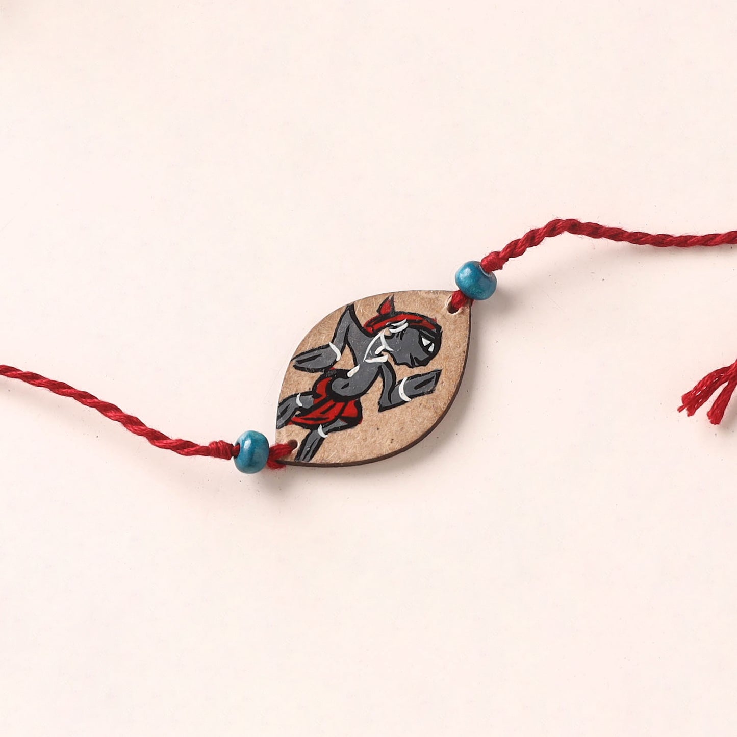Pattachitra Handpainted Wooden Rakhi 34