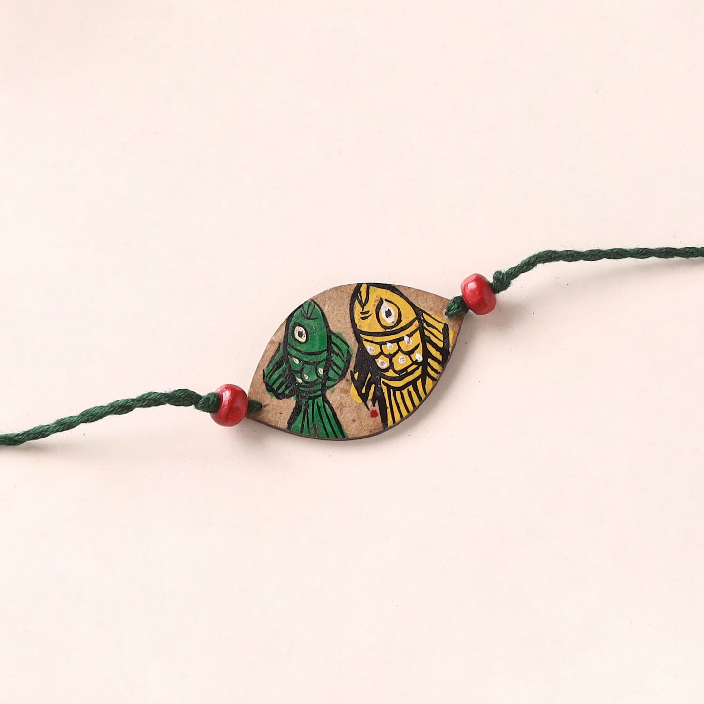 Pattachitra Handpainted Wooden Rakhi 36