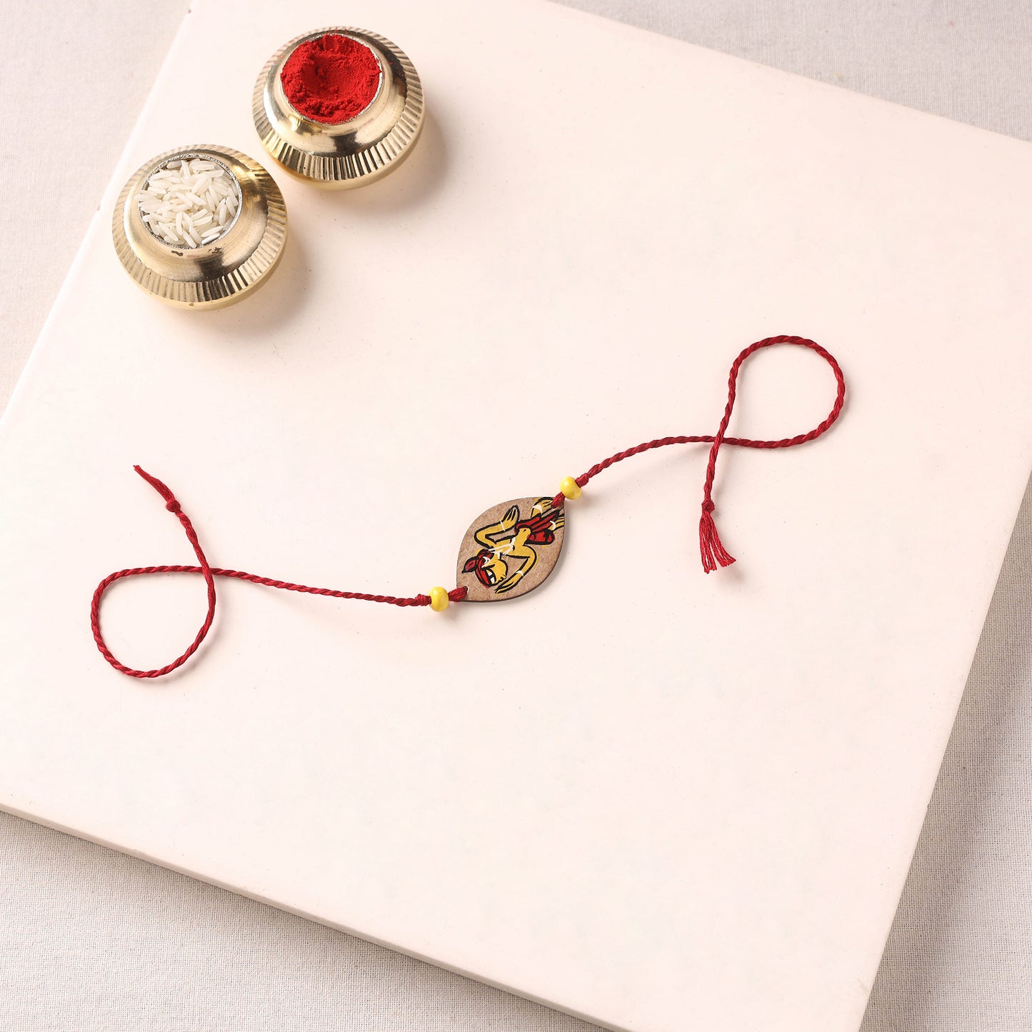 Pattachitra Handpainted Wooden Rakhi 39