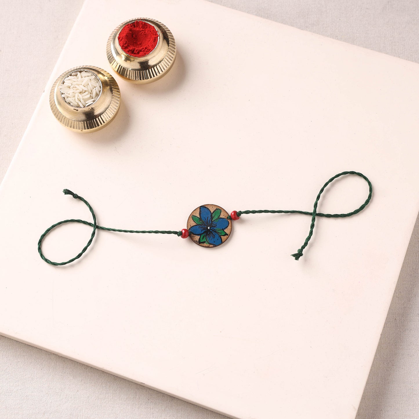 Pattachitra Handpainted Wooden Rakhi 50