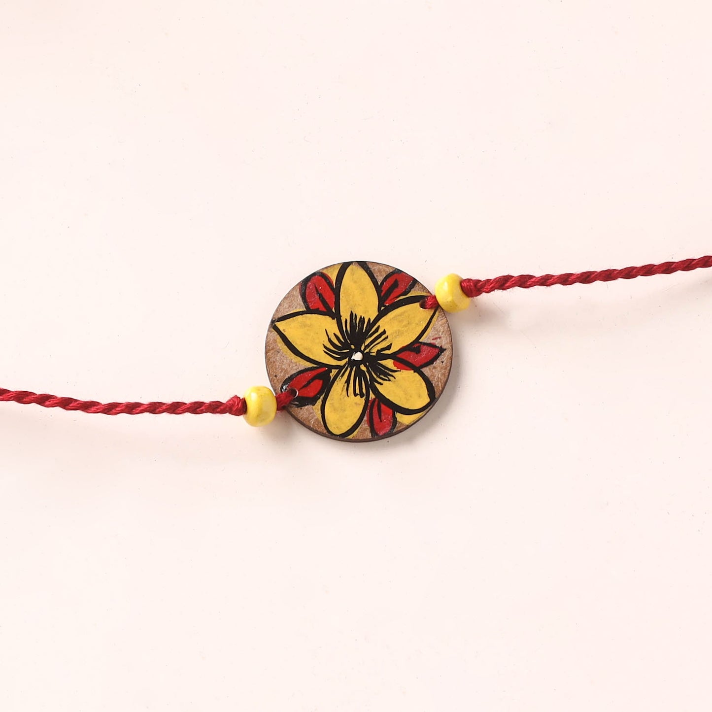 Pattachitra Handpainted Wooden Rakhi 52