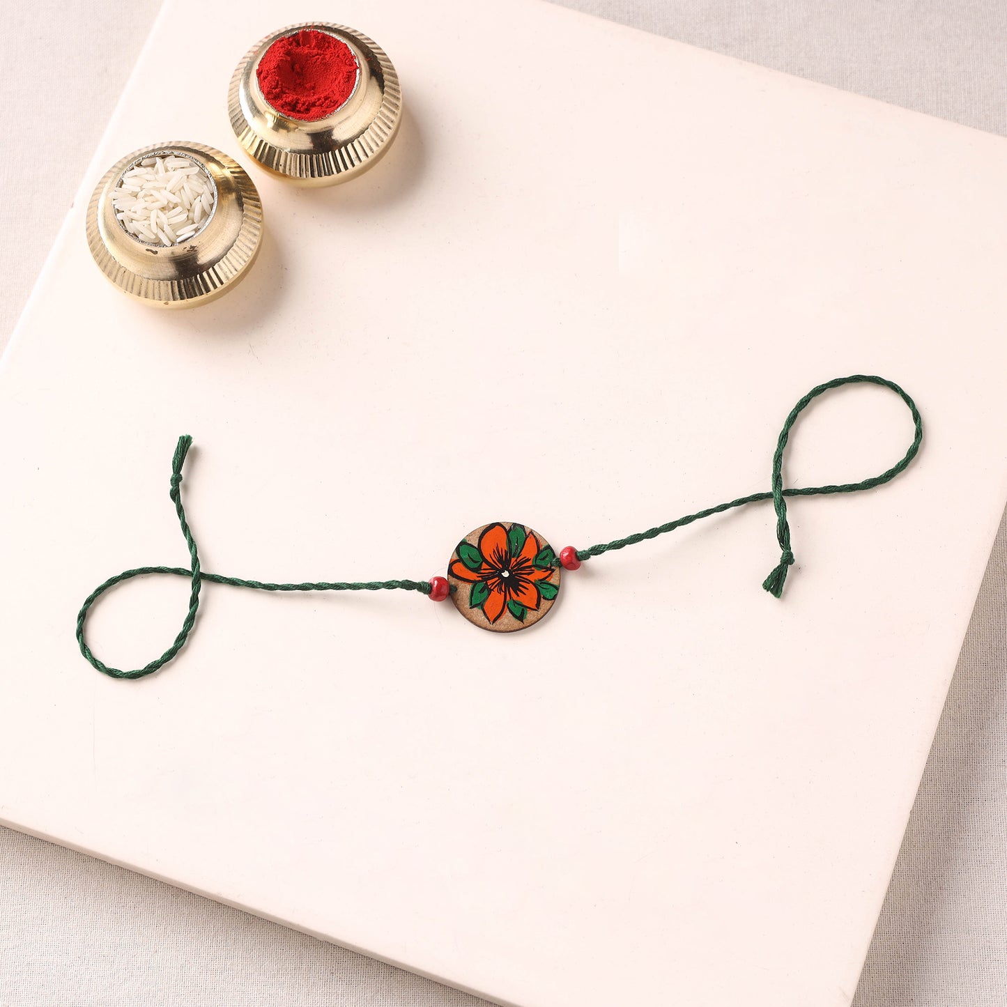 Pattachitra Handpainted Wooden Rakhi 54
