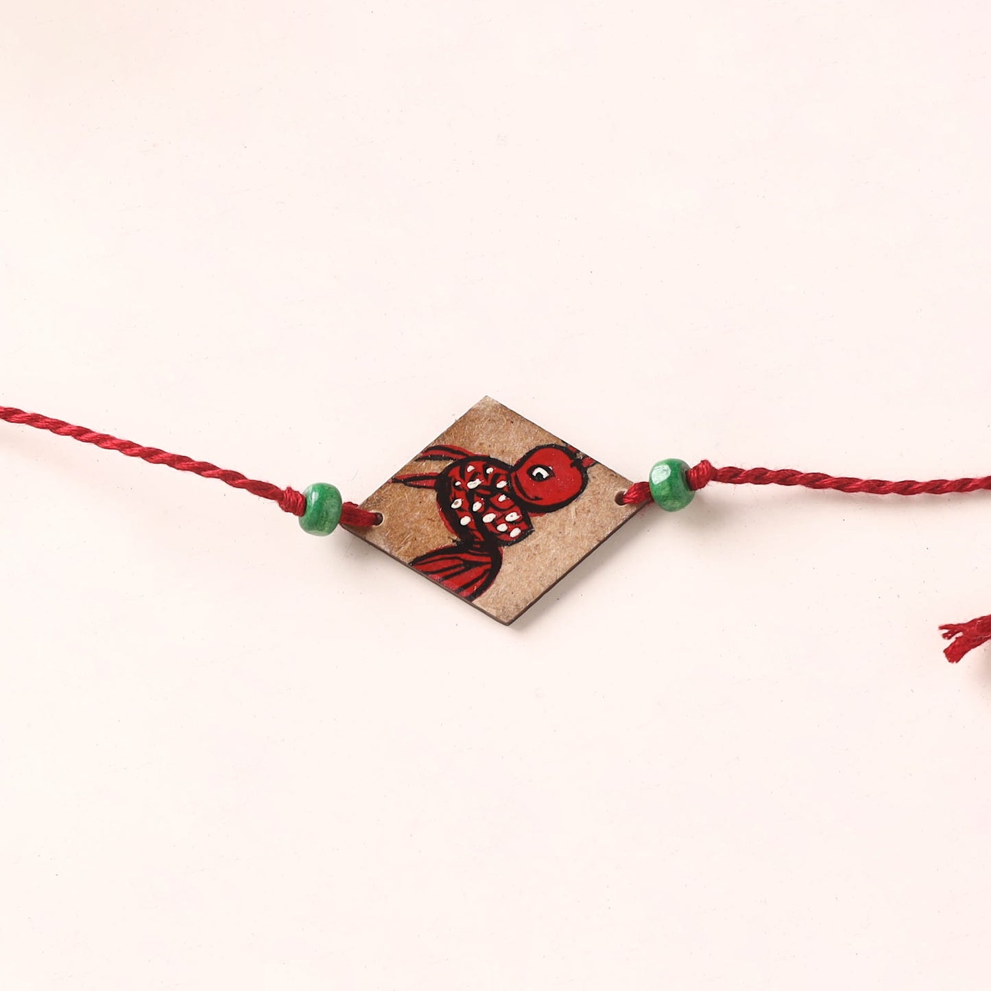 Pattachitra Handpainted Wooden Rakhi 60