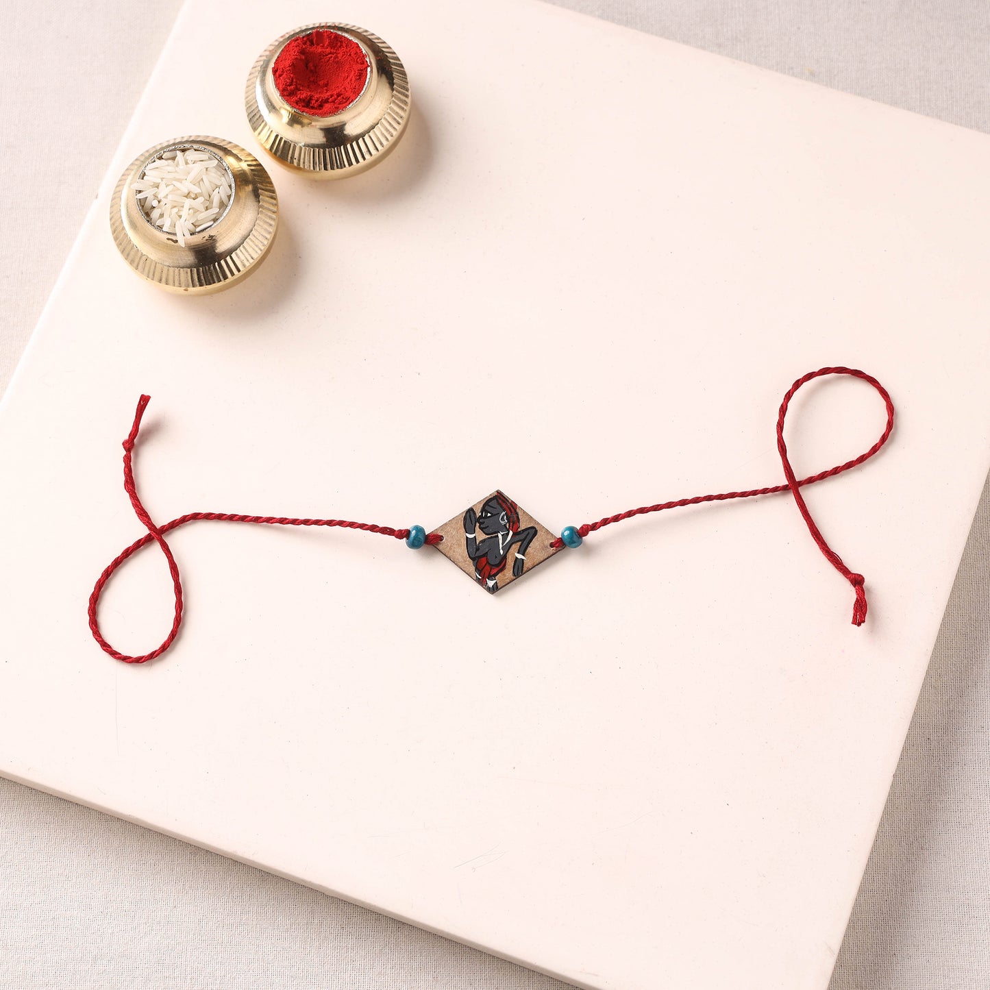 Pattachitra Handpainted Wooden Rakhi 62