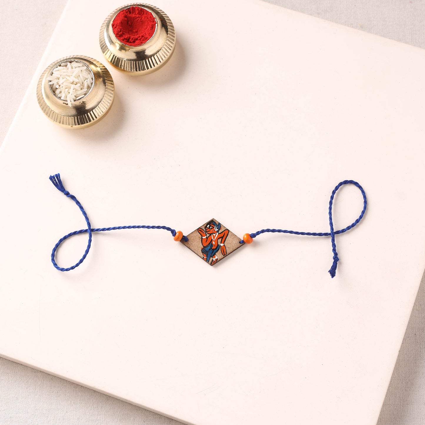 Pattachitra Handpainted Wooden Rakhi 64
