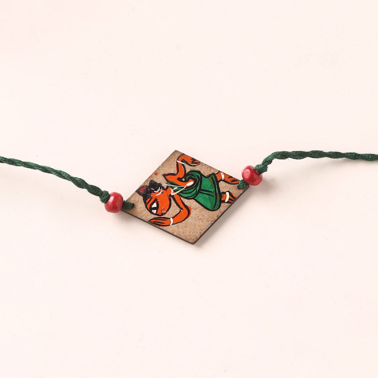 Pattachitra Handpainted Wooden Rakhi 65