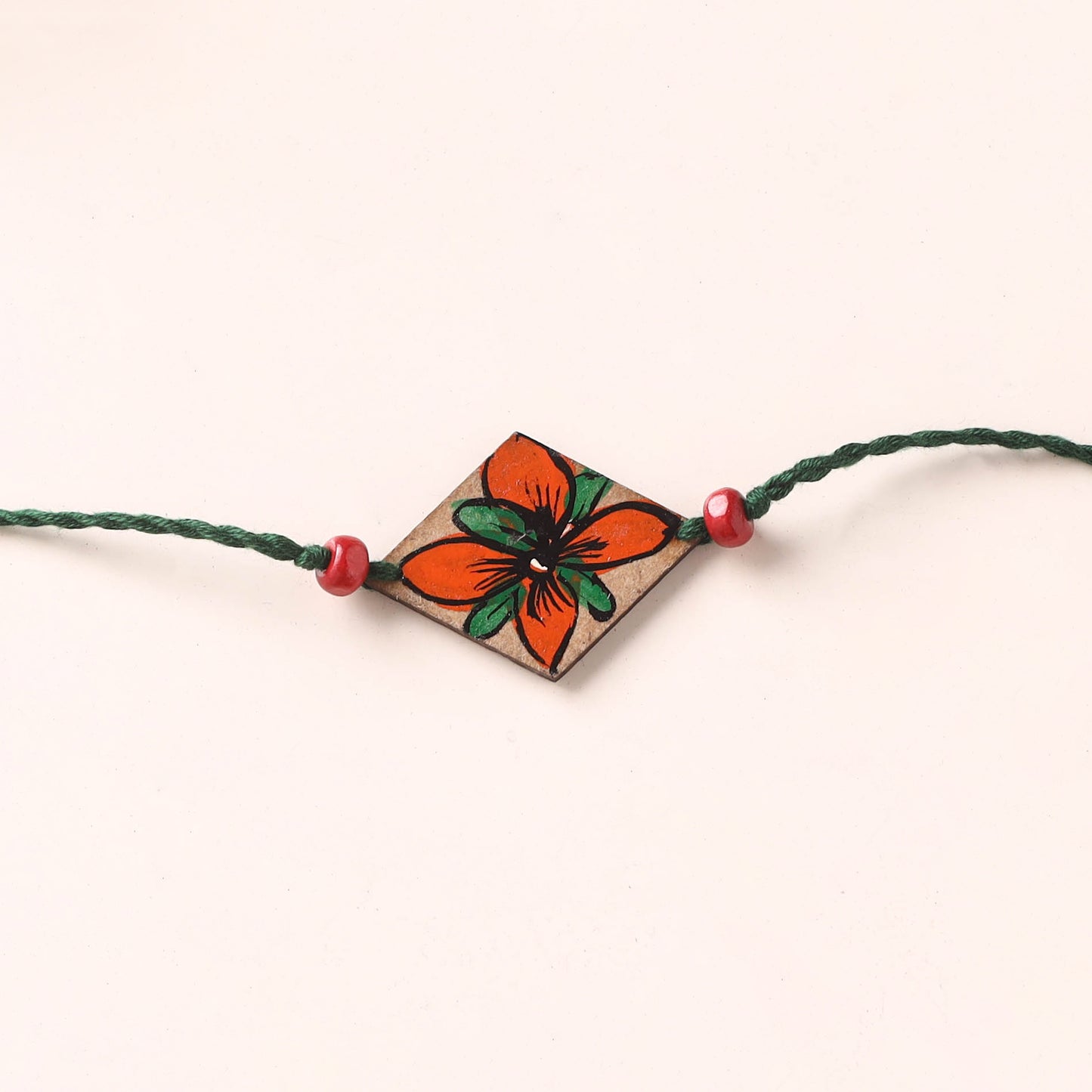 Pattachitra Handpainted Wooden Rakhi 68