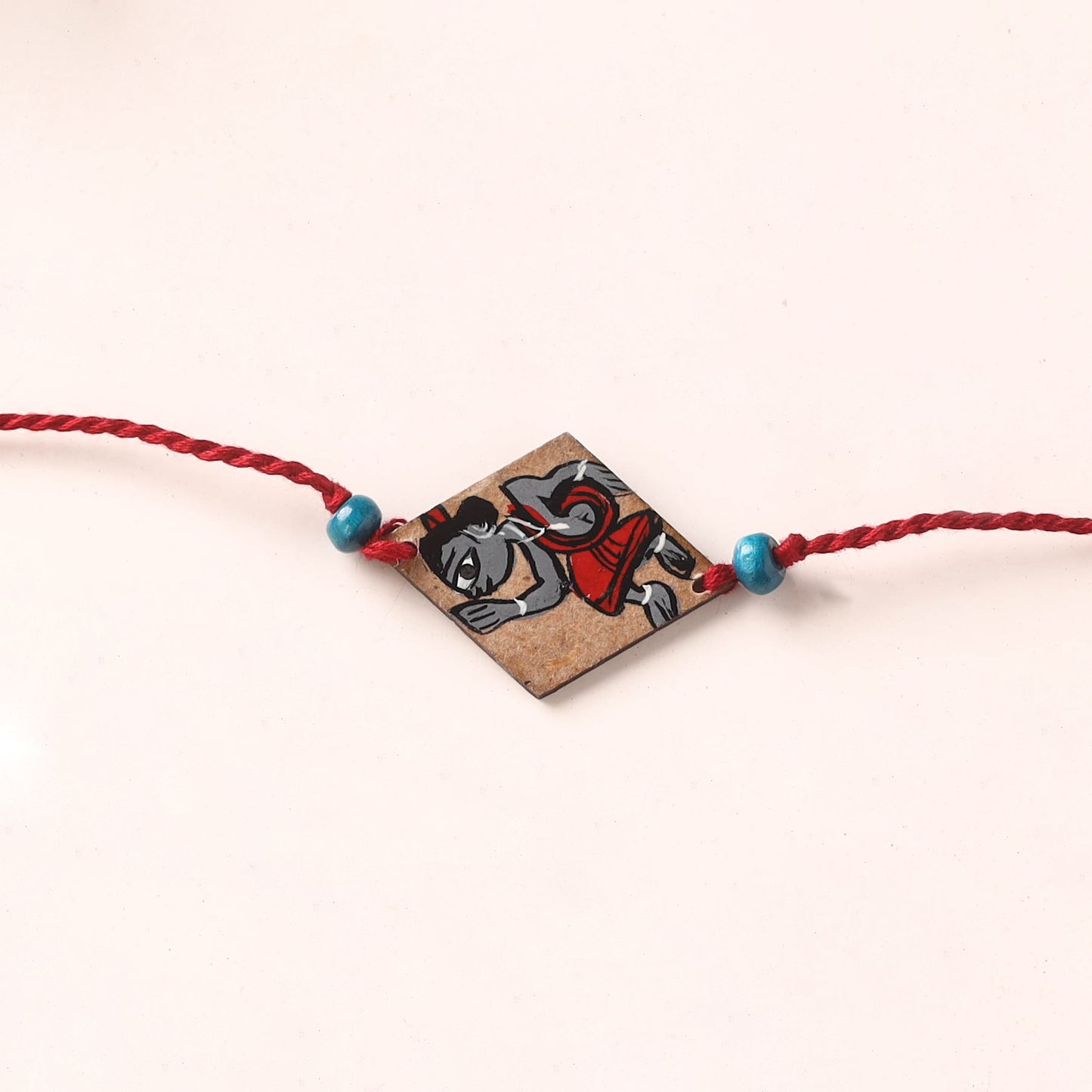 Pattachitra Handpainted Wooden Rakhi 70
