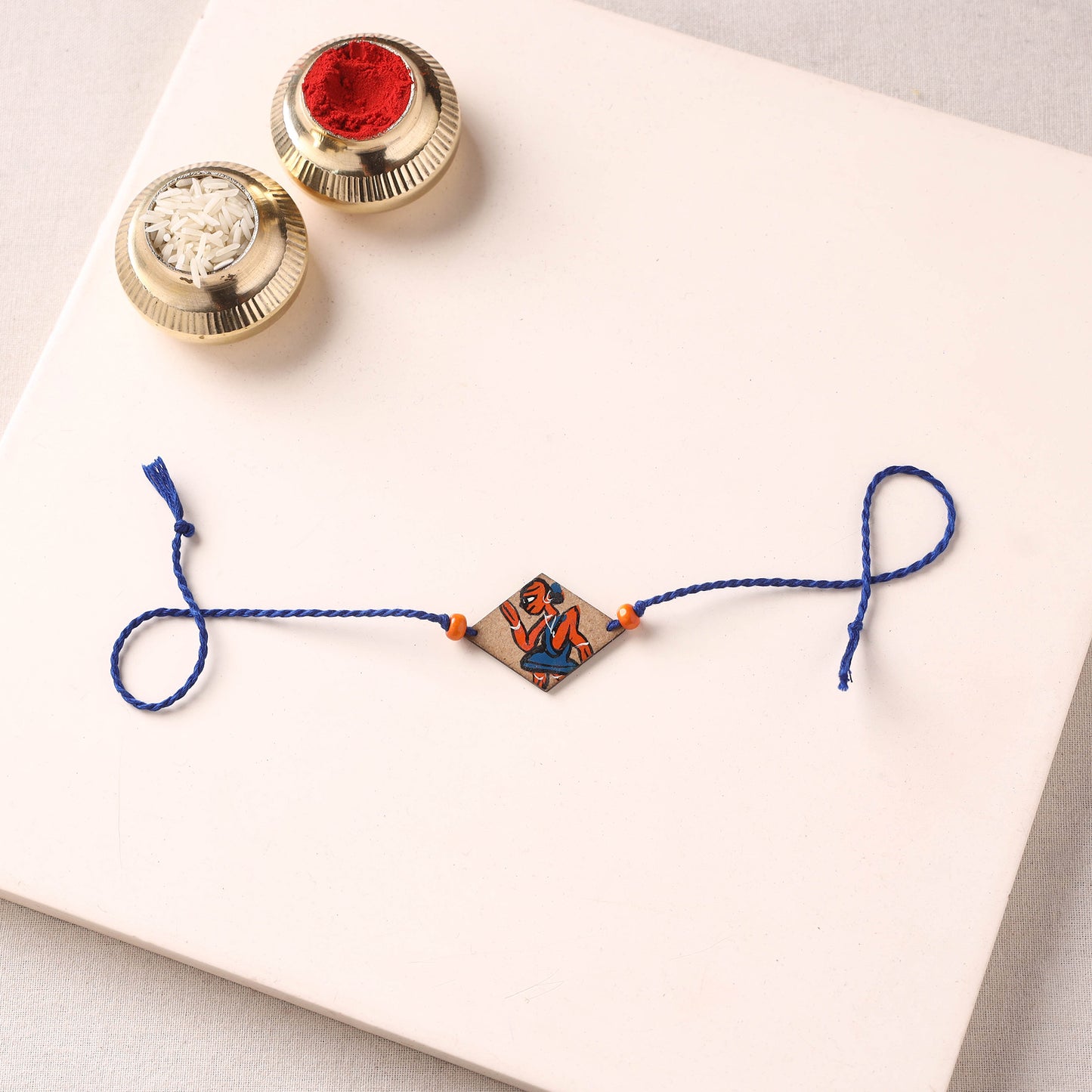 Pattachitra Handpainted Wooden Rakhi 75