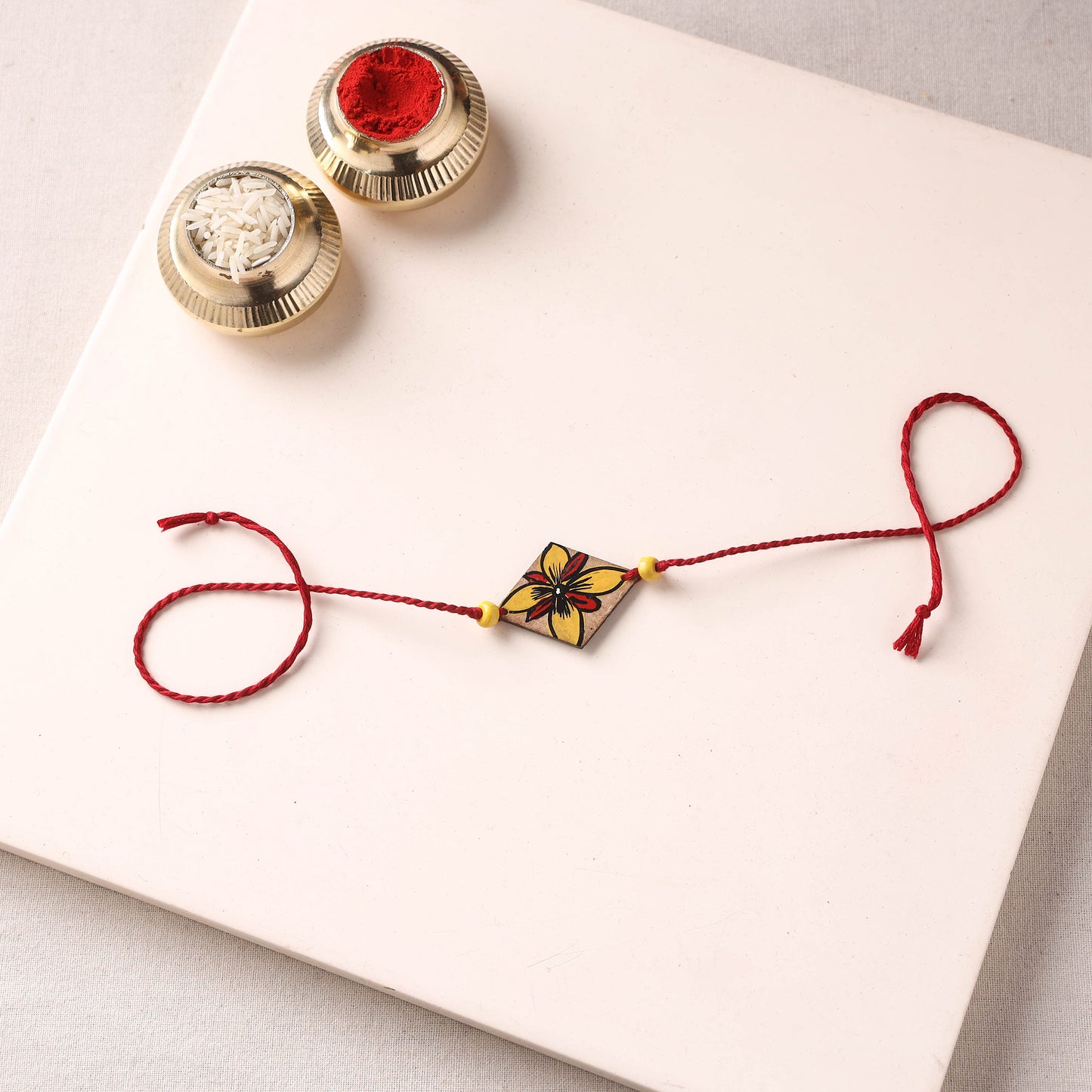 Pattachitra Handpainted Wooden Rakhi 77