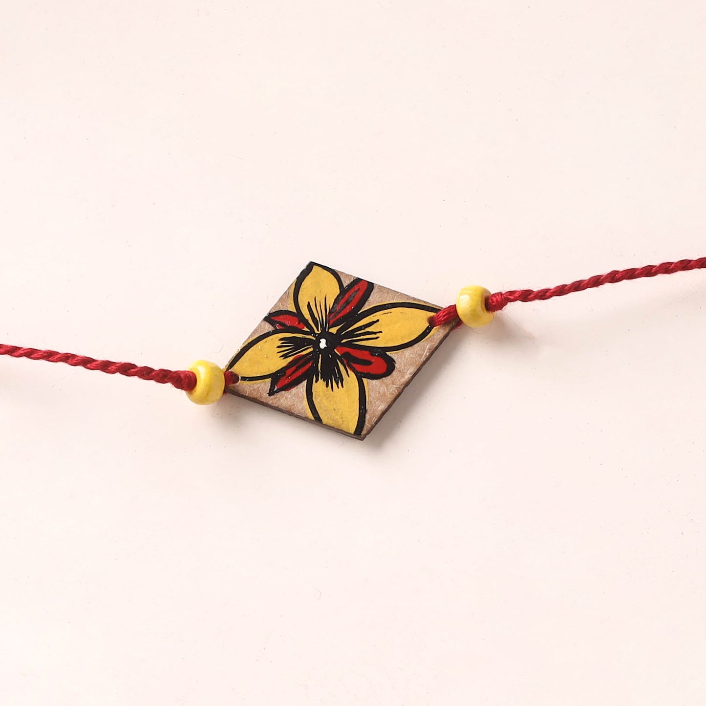 Pattachitra Handpainted Wooden Rakhi 77